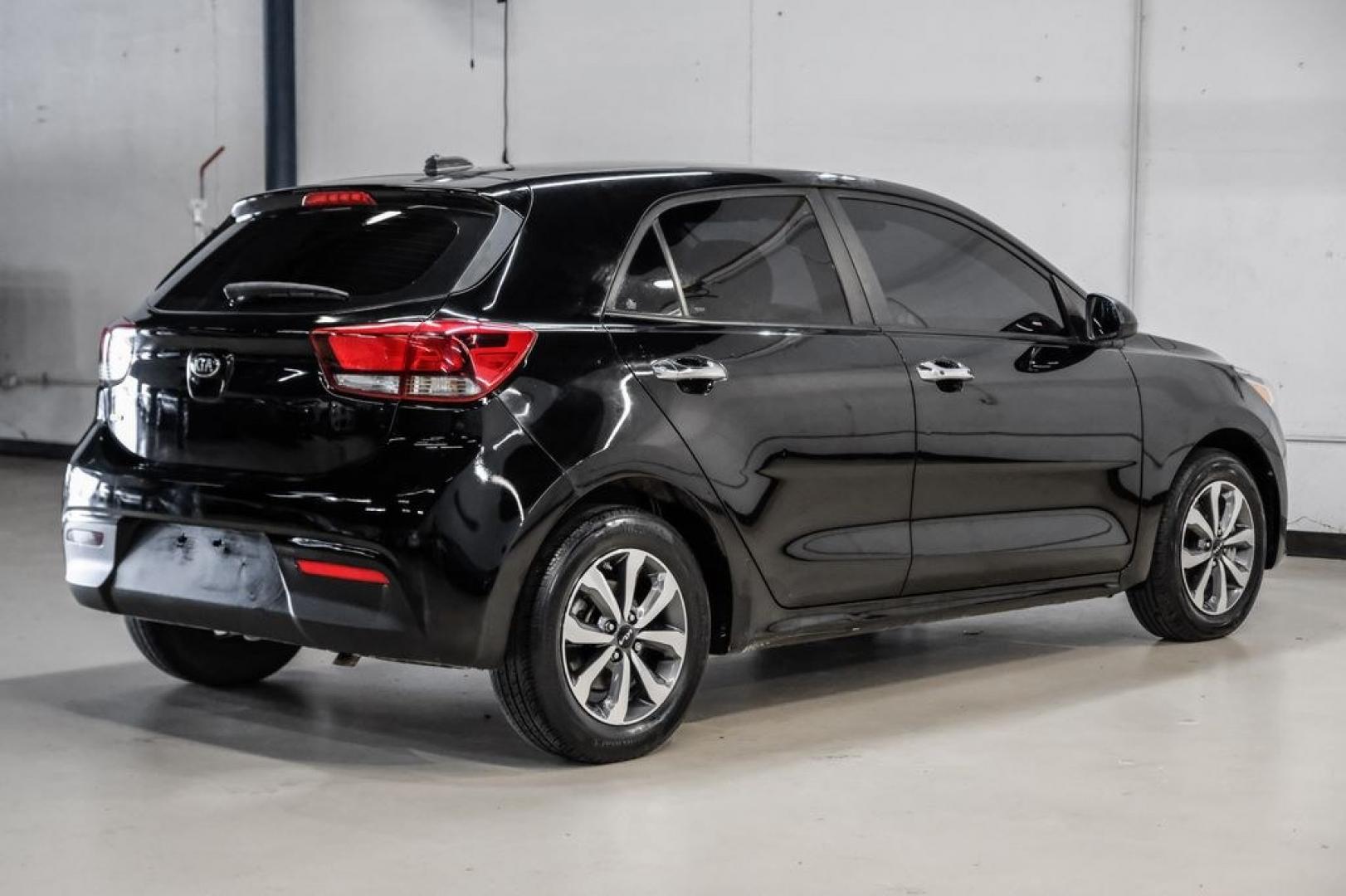 2023 Aurora Black /Gray Kia Rio S (3KPA25AD9PE) with an 1.6L 4-Cylinder engine, CVT transmission, located at 15300 Midway Rd., Addison, TX, 75001, (972) 702-0011, 32.958321, -96.838074- Photo#7