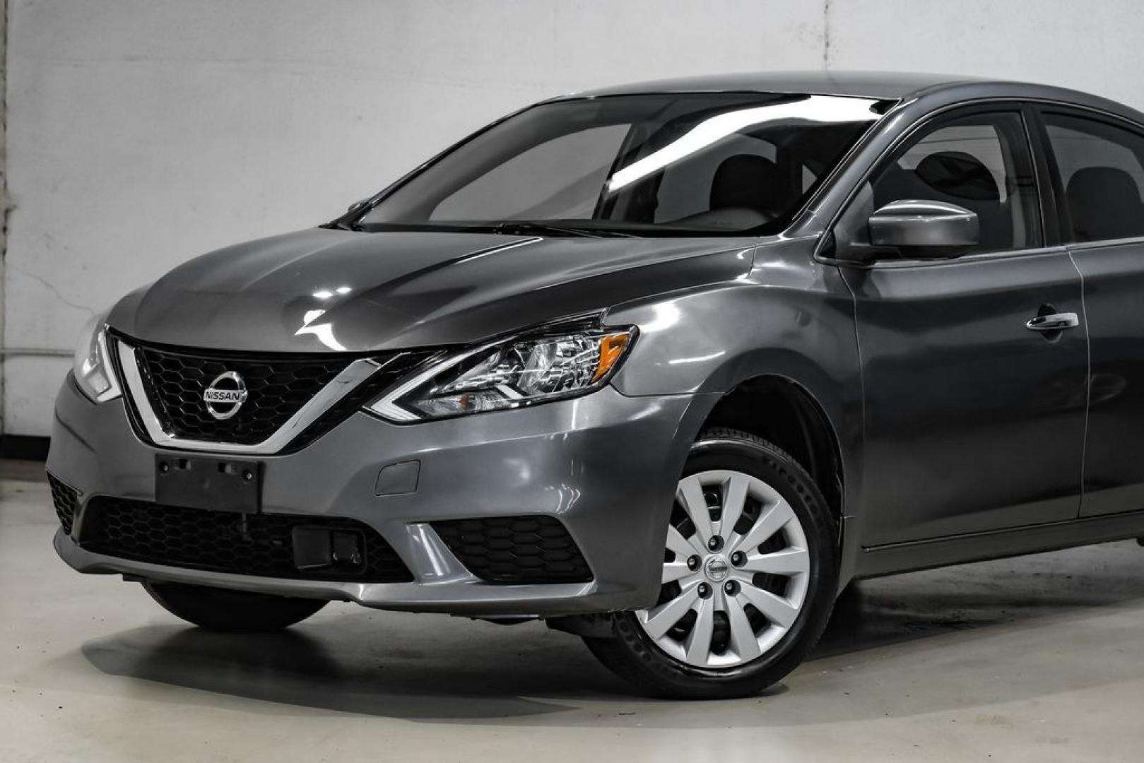 2019 Gun Metallic /Charcoal Nissan Sentra S (3N1AB7AP4KY) with an 1.8L 4-Cylinder DOHC 16V engine, CVT transmission, located at 15300 Midway Rd., Addison, TX, 75001, (972) 702-0011, 32.958321, -96.838074- Photo#3