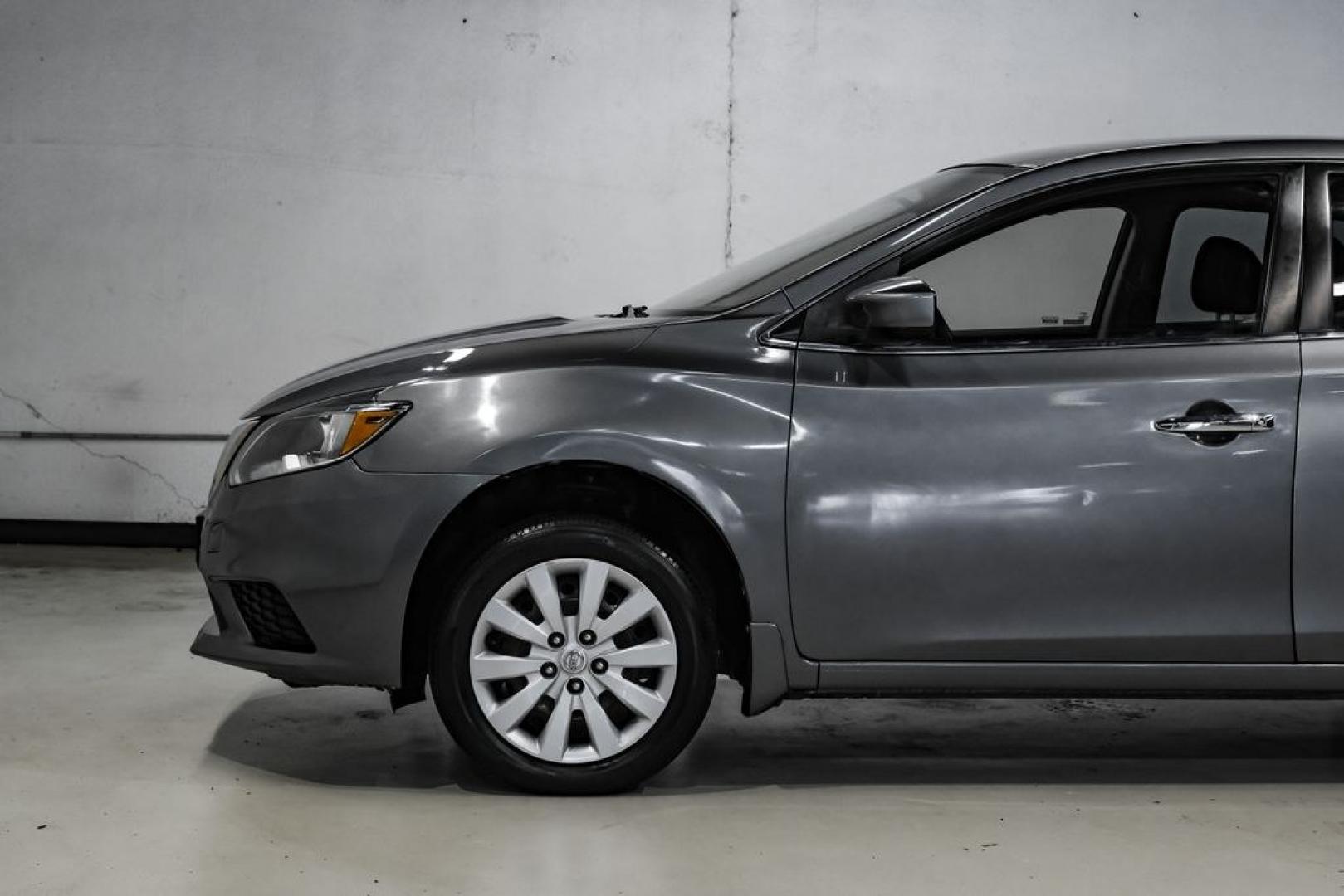 2019 Gun Metallic /Charcoal Nissan Sentra S (3N1AB7AP4KY) with an 1.8L 4-Cylinder DOHC 16V engine, CVT transmission, located at 15300 Midway Rd., Addison, TX, 75001, (972) 702-0011, 32.958321, -96.838074- Photo#14