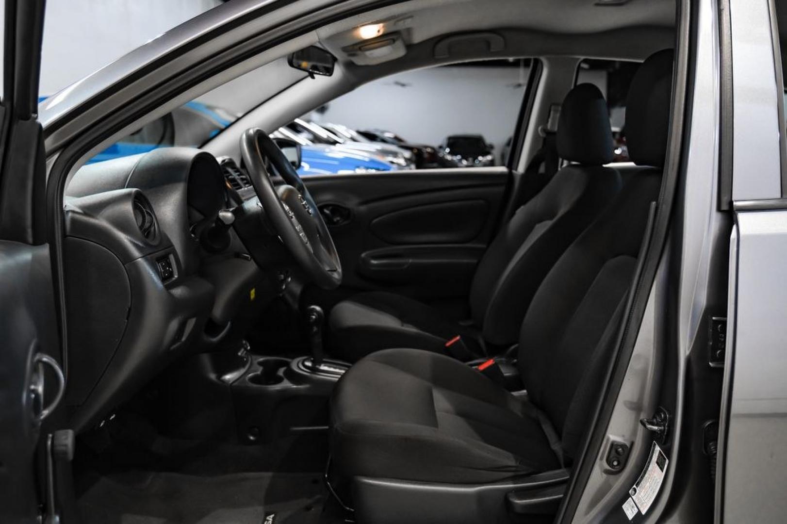 2019 Gun Metallic /Charcoal Nissan Versa 1.6 S Plus (3N1CN7APXKL) with an 1.6L 4-Cylinder DOHC 16V engine, CVT transmission, located at 15300 Midway Rd., Addison, TX, 75001, (972) 702-0011, 32.958321, -96.838074- Photo#2