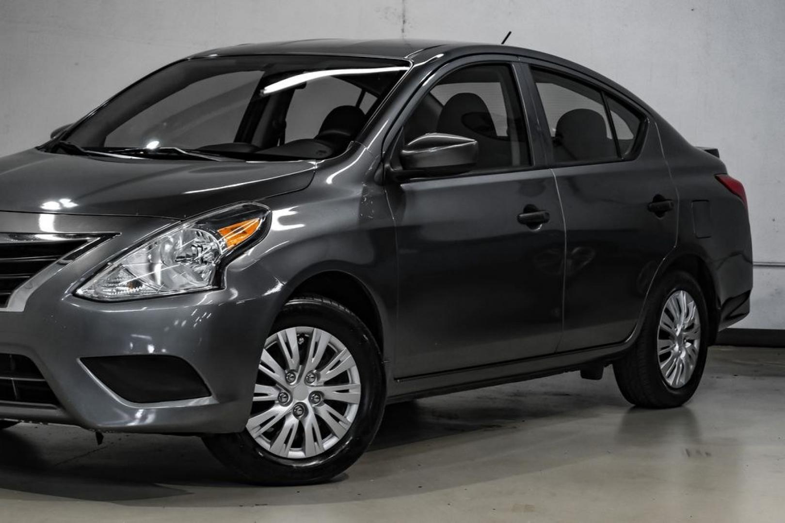 2019 Gun Metallic /Charcoal Nissan Versa 1.6 S Plus (3N1CN7APXKL) with an 1.6L 4-Cylinder DOHC 16V engine, CVT transmission, located at 15300 Midway Rd., Addison, TX, 75001, (972) 702-0011, 32.958321, -96.838074- Photo#4