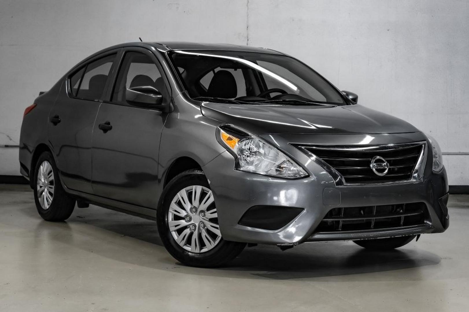 2019 Gun Metallic /Charcoal Nissan Versa 1.6 S Plus (3N1CN7APXKL) with an 1.6L 4-Cylinder DOHC 16V engine, CVT transmission, located at 15300 Midway Rd., Addison, TX, 75001, (972) 702-0011, 32.958321, -96.838074- Photo#6