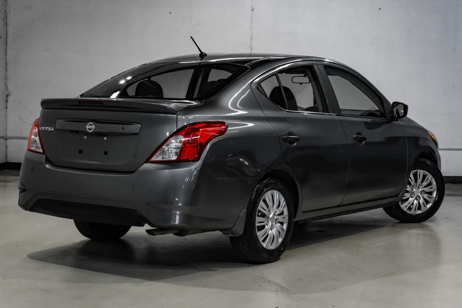 2019 Gun Metallic /Charcoal Nissan Versa 1.6 S Plus (3N1CN7APXKL) with an 1.6L 4-Cylinder DOHC 16V engine, CVT transmission, located at 15300 Midway Rd., Addison, TX, 75001, (972) 702-0011, 32.958321, -96.838074- Photo#8