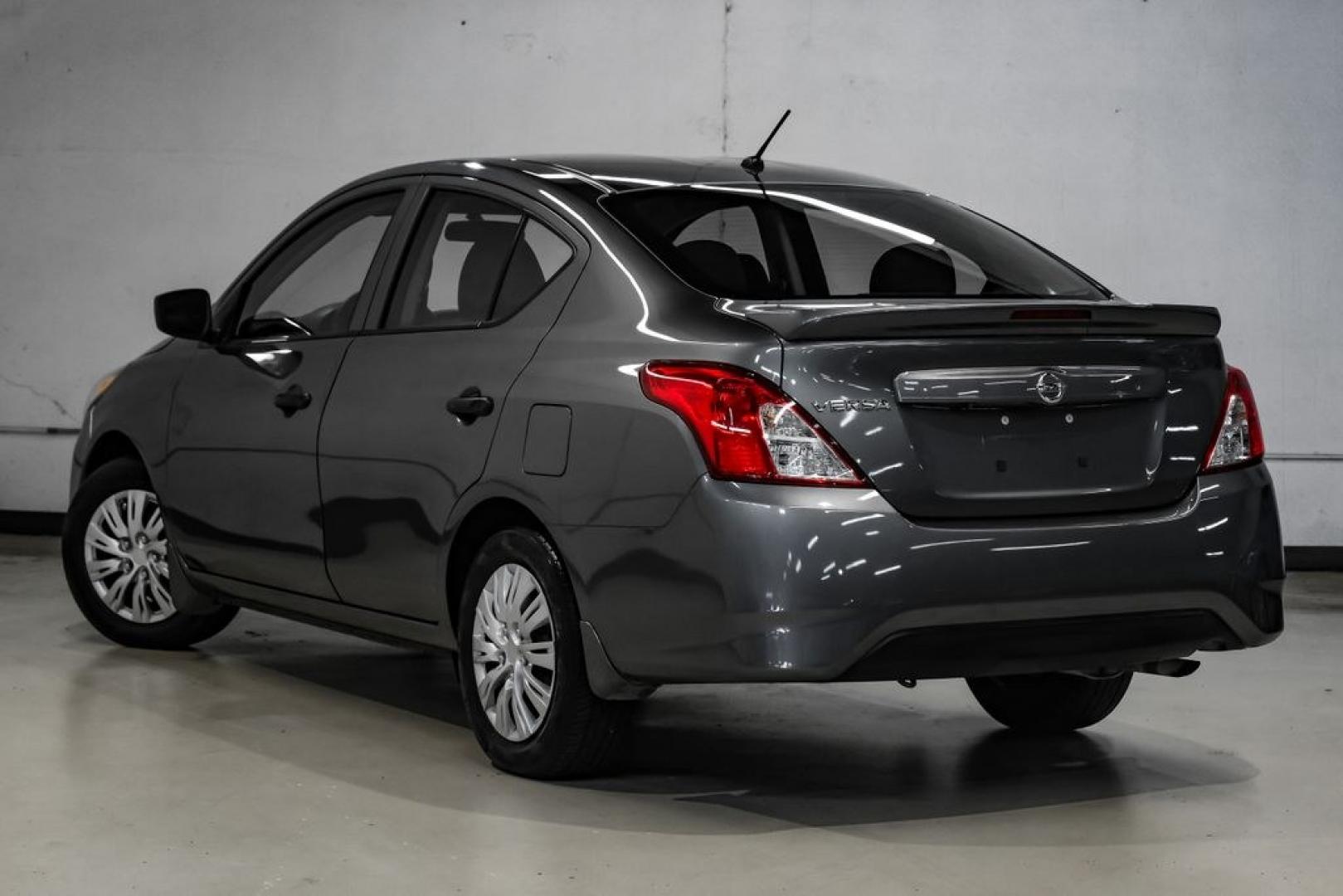 2019 Gun Metallic /Charcoal Nissan Versa 1.6 S Plus (3N1CN7APXKL) with an 1.6L 4-Cylinder DOHC 16V engine, CVT transmission, located at 15300 Midway Rd., Addison, TX, 75001, (972) 702-0011, 32.958321, -96.838074- Photo#10