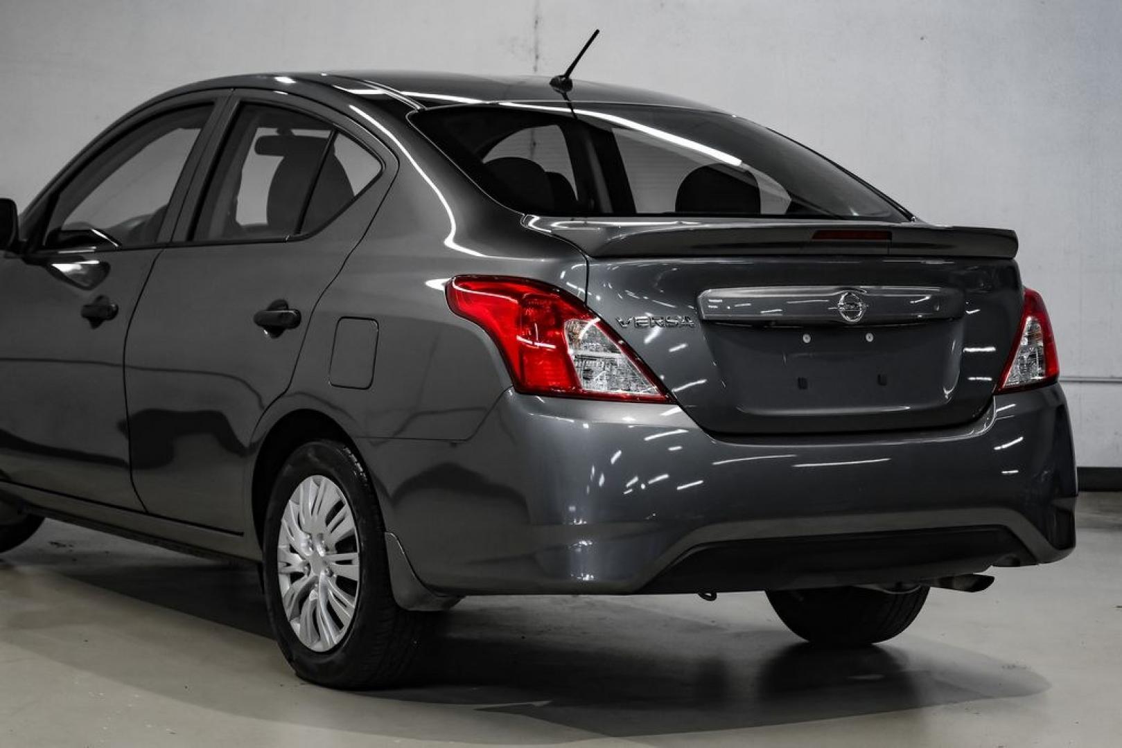 2019 Gun Metallic /Charcoal Nissan Versa 1.6 S Plus (3N1CN7APXKL) with an 1.6L 4-Cylinder DOHC 16V engine, CVT transmission, located at 15300 Midway Rd., Addison, TX, 75001, (972) 702-0011, 32.958321, -96.838074- Photo#12