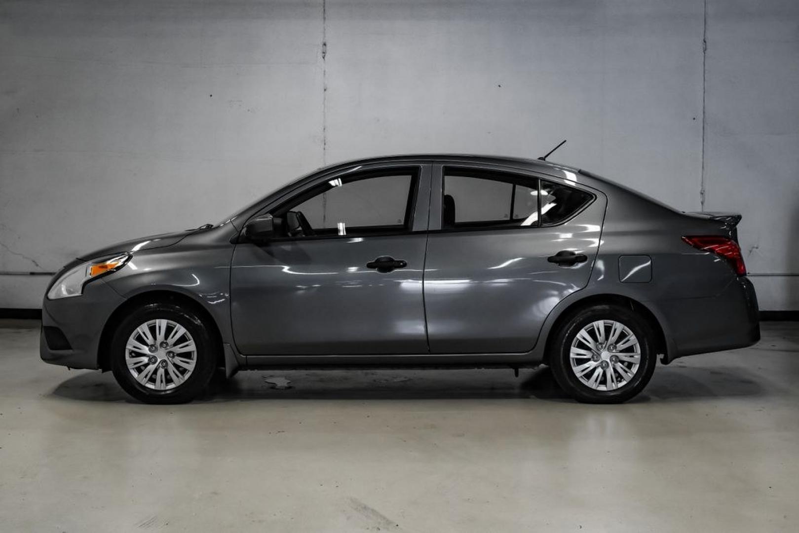 2019 Gun Metallic /Charcoal Nissan Versa 1.6 S Plus (3N1CN7APXKL) with an 1.6L 4-Cylinder DOHC 16V engine, CVT transmission, located at 15300 Midway Rd., Addison, TX, 75001, (972) 702-0011, 32.958321, -96.838074- Photo#13