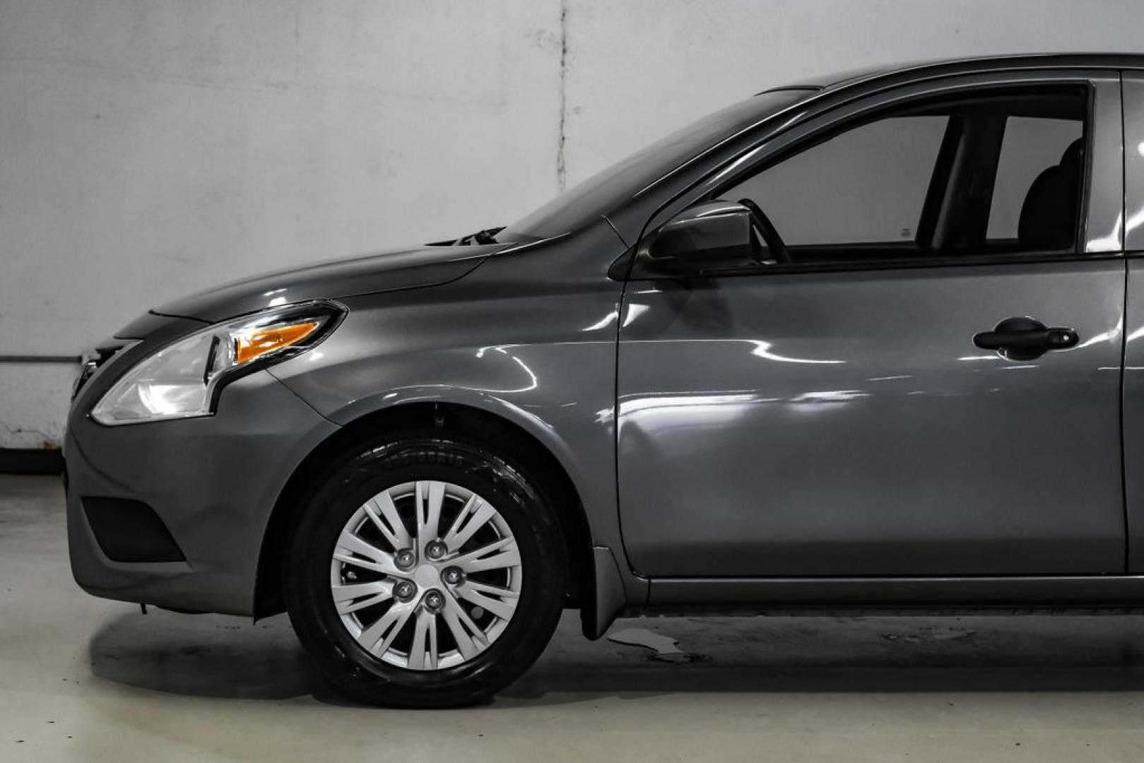 2019 Gun Metallic /Charcoal Nissan Versa 1.6 S Plus (3N1CN7APXKL) with an 1.6L 4-Cylinder DOHC 16V engine, CVT transmission, located at 15300 Midway Rd., Addison, TX, 75001, (972) 702-0011, 32.958321, -96.838074- Photo#14