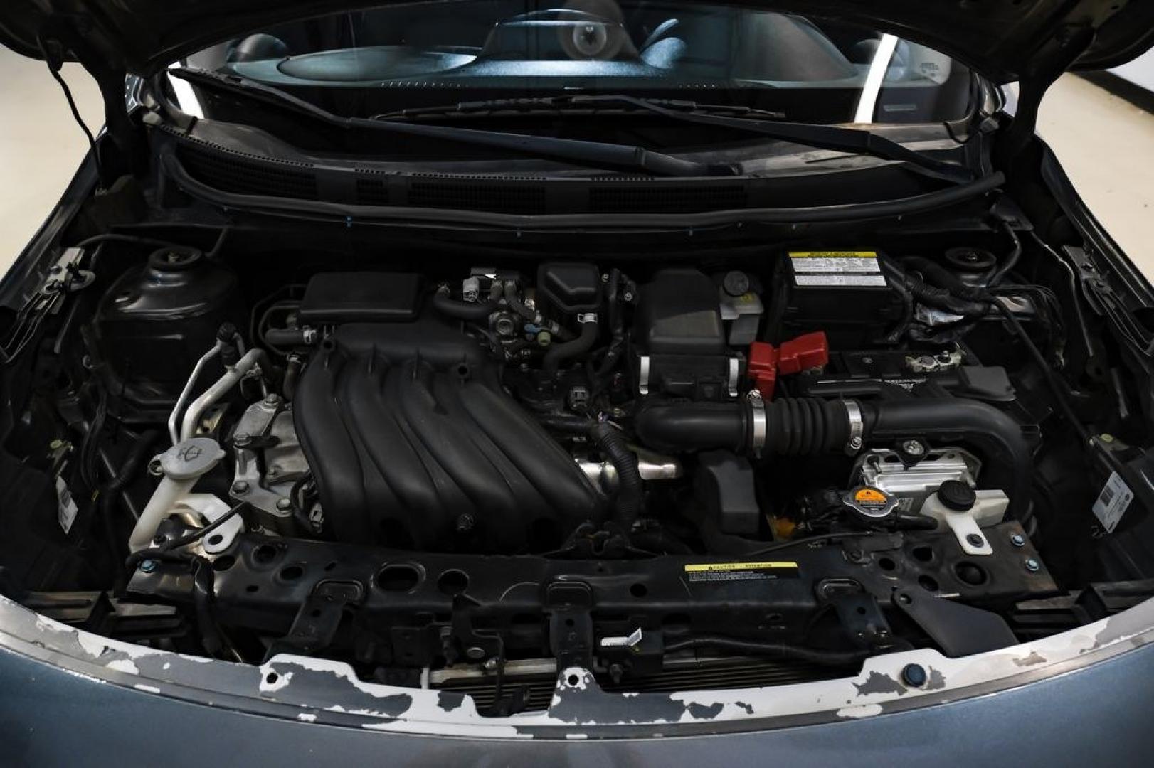 2019 Gun Metallic /Charcoal Nissan Versa 1.6 S Plus (3N1CN7APXKL) with an 1.6L 4-Cylinder DOHC 16V engine, CVT transmission, located at 15300 Midway Rd., Addison, TX, 75001, (972) 702-0011, 32.958321, -96.838074- Photo#45