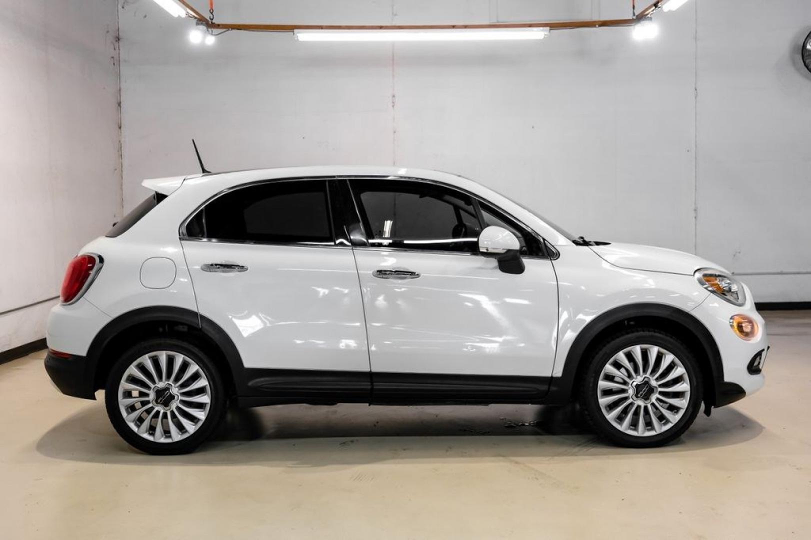 2016 White Clearcoat /Black Fiat 500X Lounge (ZFBCFXDT9GP) with an 2.4L I4 MultiAir engine, Automatic transmission, located at 15300 Midway Rd., Addison, TX, 75001, (972) 702-0011, 32.958321, -96.838074- Photo#7