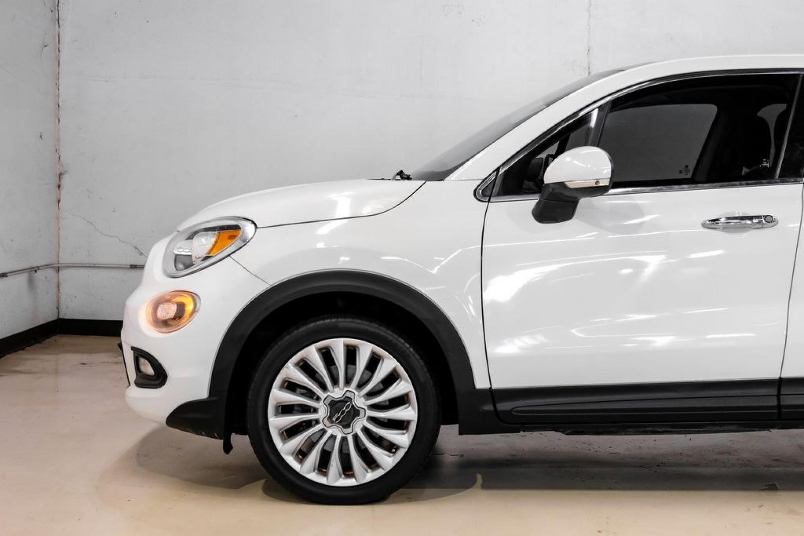 2016 White Clearcoat /Black Fiat 500X Lounge (ZFBCFXDT9GP) with an 2.4L I4 MultiAir engine, Automatic transmission, located at 15300 Midway Rd., Addison, TX, 75001, (972) 702-0011, 32.958321, -96.838074- Photo#12