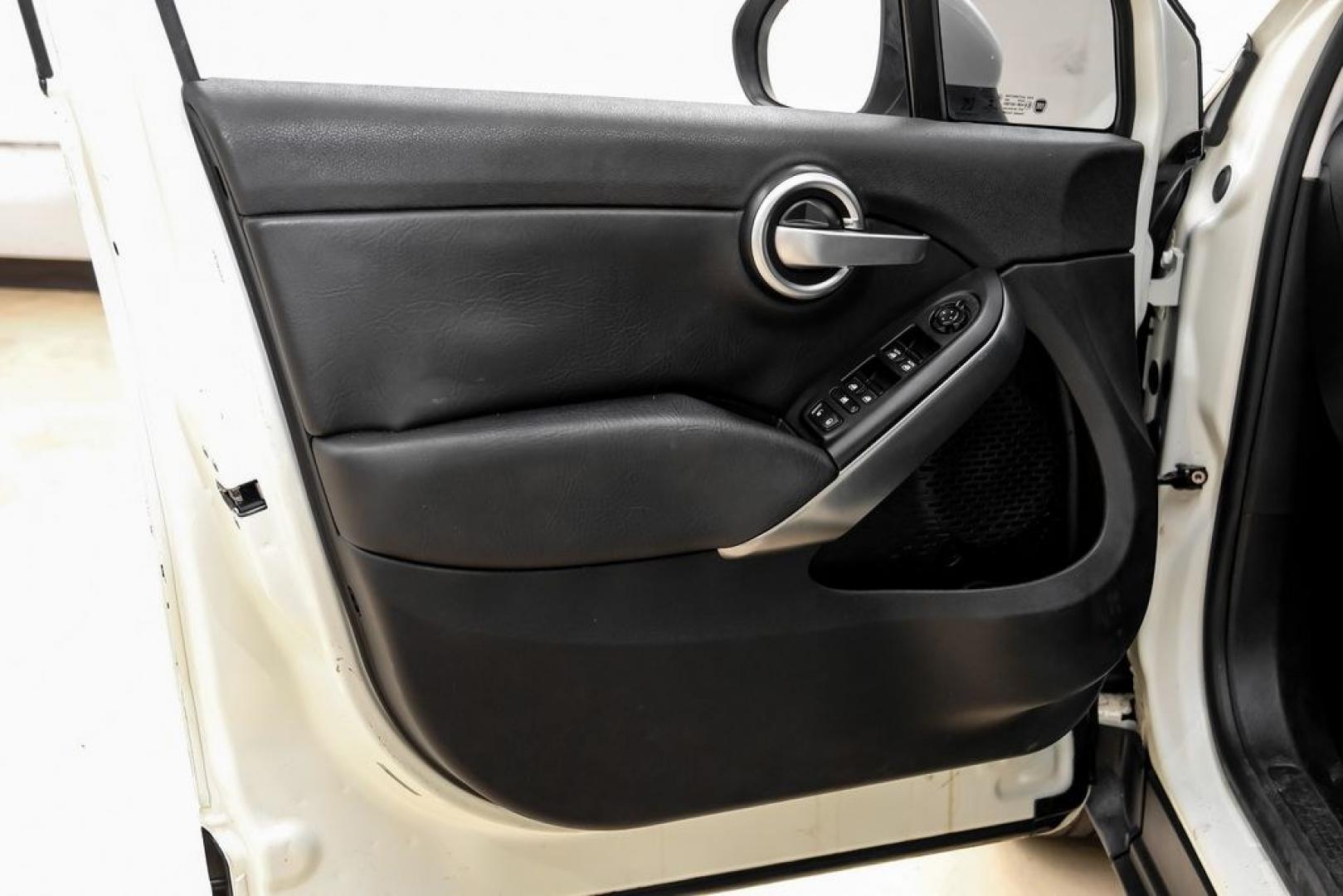 2016 White Clearcoat /Black Fiat 500X Lounge (ZFBCFXDT9GP) with an 2.4L I4 MultiAir engine, Automatic transmission, located at 15300 Midway Rd., Addison, TX, 75001, (972) 702-0011, 32.958321, -96.838074- Photo#46