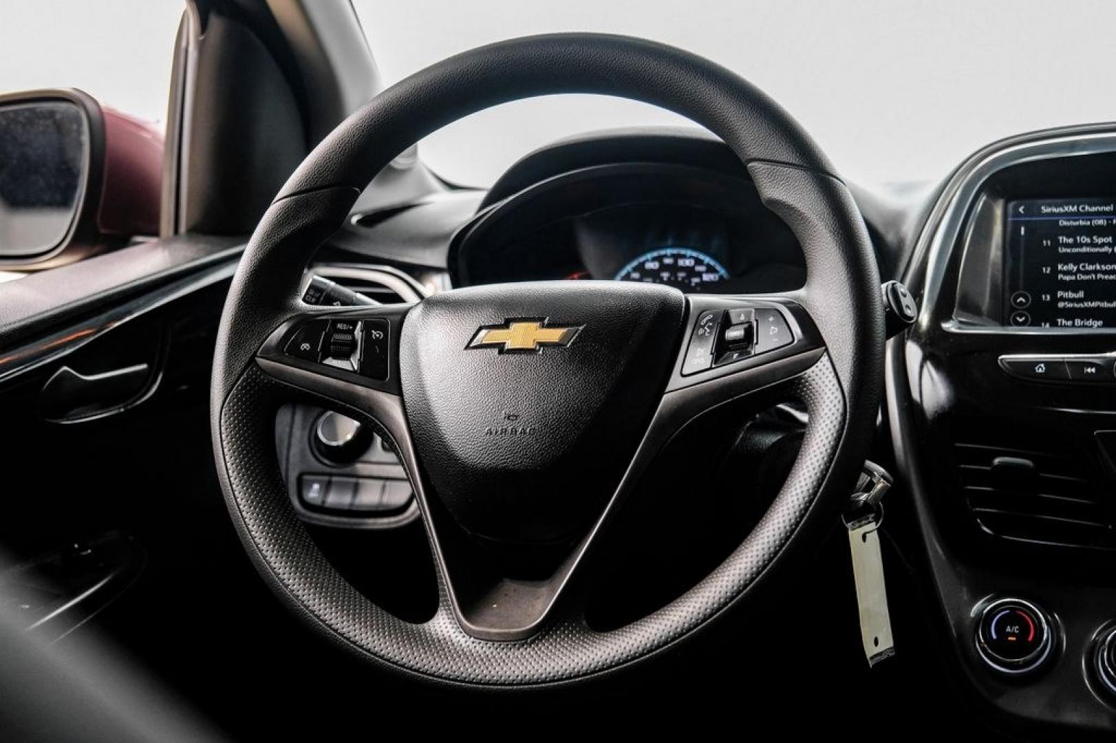 2021 Passion Fruit /Jet Black/Dark Anderson Silver Metallic Chevrolet Spark 1LT (KL8CD6SA8MC) with an 1.4L DOHC engine, CVT transmission, located at 15300 Midway Rd., Addison, TX, 75001, (972) 702-0011, 32.958321, -96.838074- Photo#19