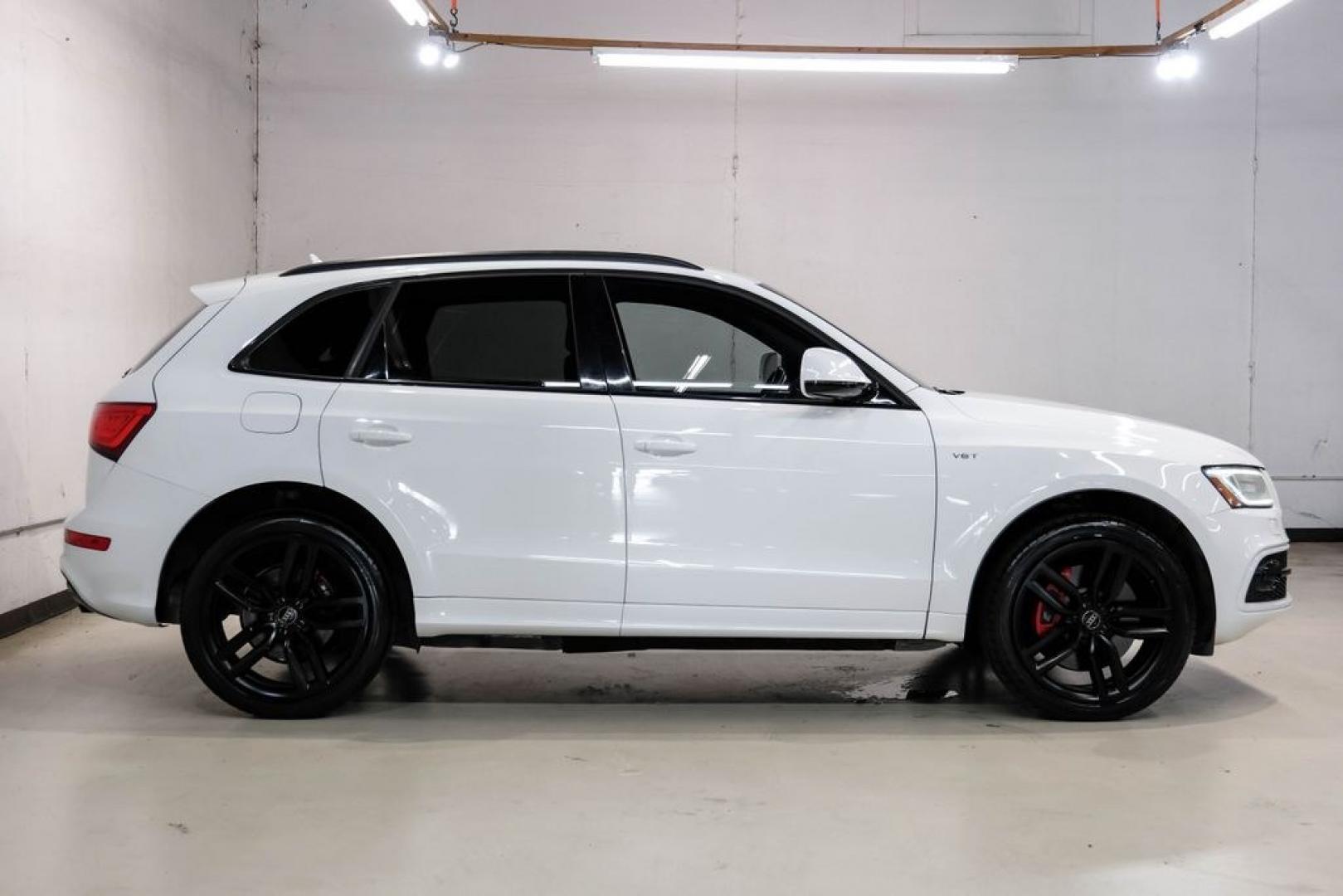 2016 Ibis White /black Audi SQ5 3.0T Premium Plus (WA1CCAFP8GA) with an 3.0L V6 Turbocharged DOHC 24V ULEV II 354hp engine, Automatic transmission, located at 15300 Midway Rd., Addison, TX, 75001, (972) 702-0011, 32.958321, -96.838074- Photo#7