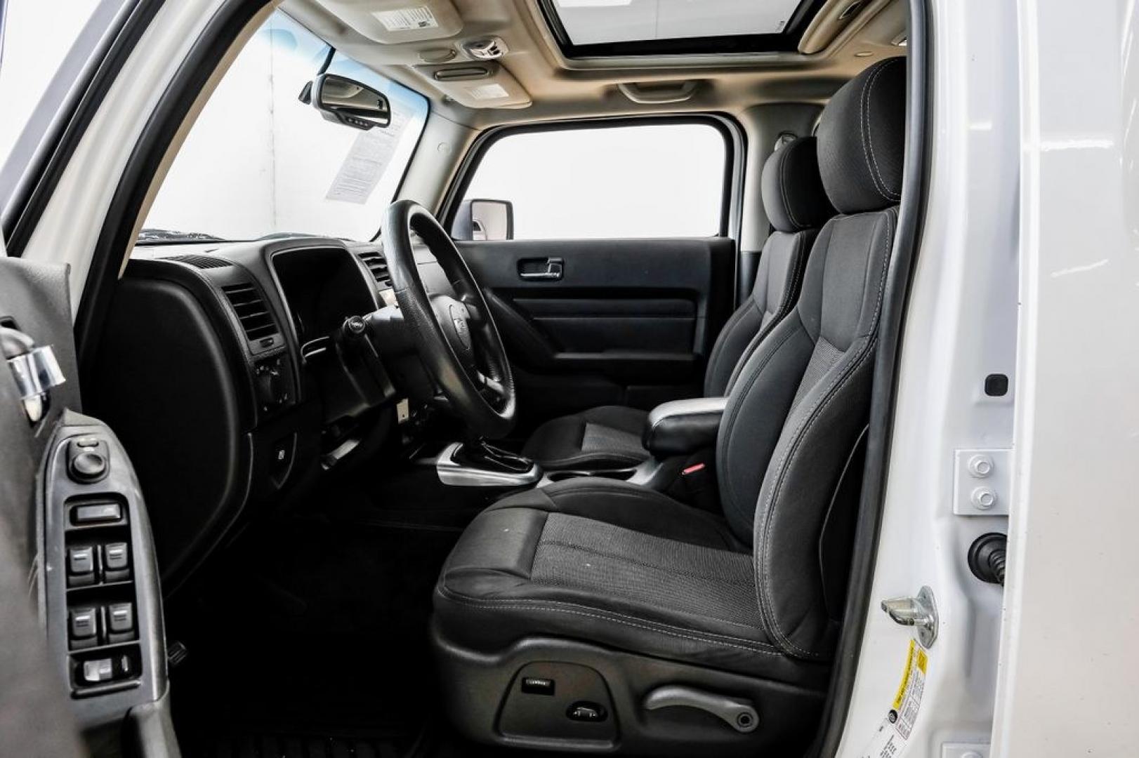 2009 Birch White /Ebony Hummer H3 Base (5GTEN13E998) with an 3.7L 5-Cylinder MPI DOHC engine, Automatic transmission, located at 15300 Midway Rd., Addison, TX, 75001, (972) 702-0011, 32.958321, -96.838074- Photo#3