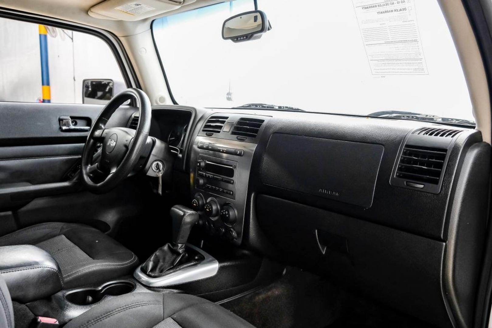 2009 Birch White /Ebony Hummer H3 Base (5GTEN13E998) with an 3.7L 5-Cylinder MPI DOHC engine, Automatic transmission, located at 15300 Midway Rd., Addison, TX, 75001, (972) 702-0011, 32.958321, -96.838074- Photo#20