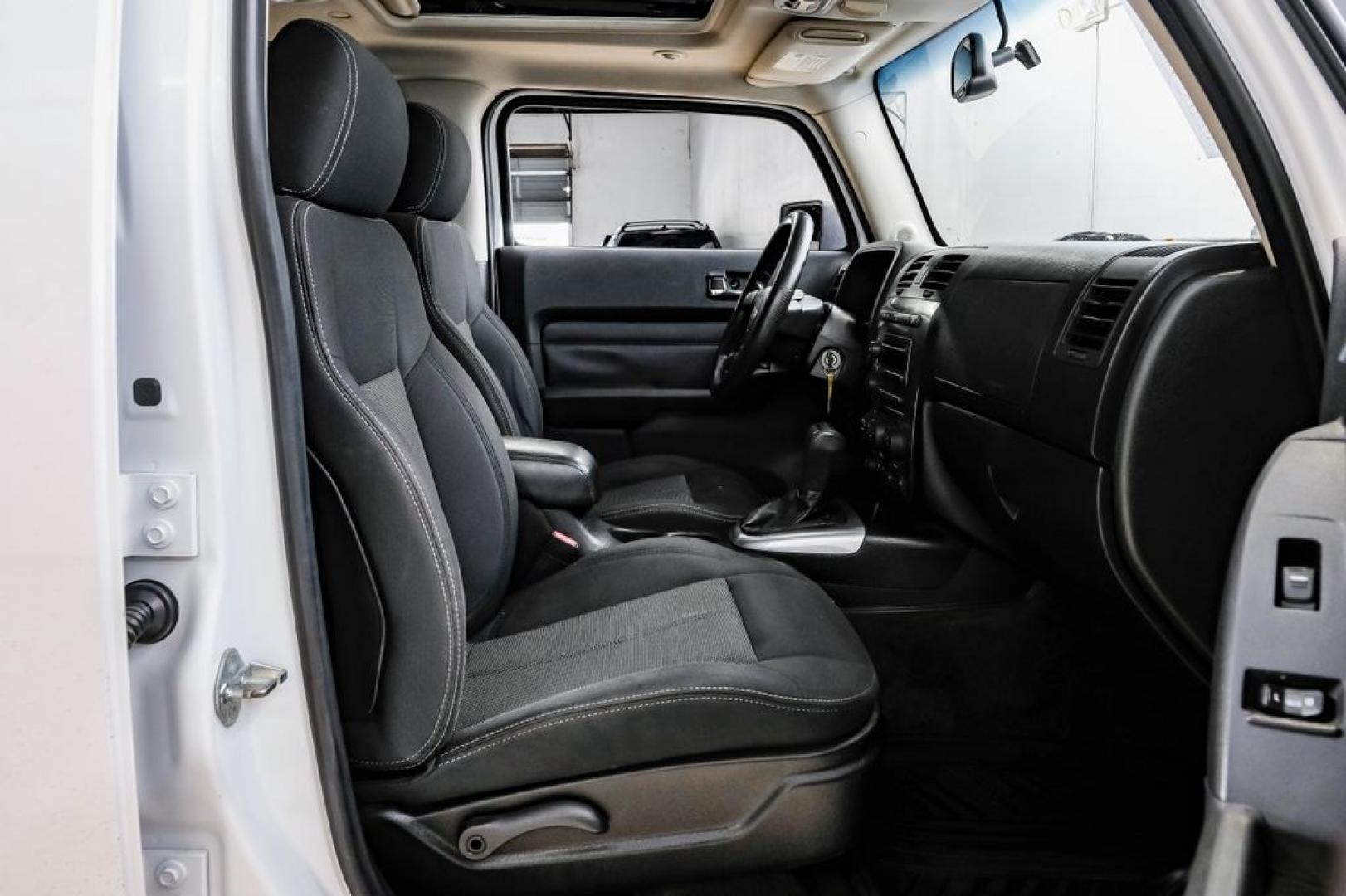 2009 Birch White /Ebony Hummer H3 Base (5GTEN13E998) with an 3.7L 5-Cylinder MPI DOHC engine, Automatic transmission, located at 15300 Midway Rd., Addison, TX, 75001, (972) 702-0011, 32.958321, -96.838074- Photo#36