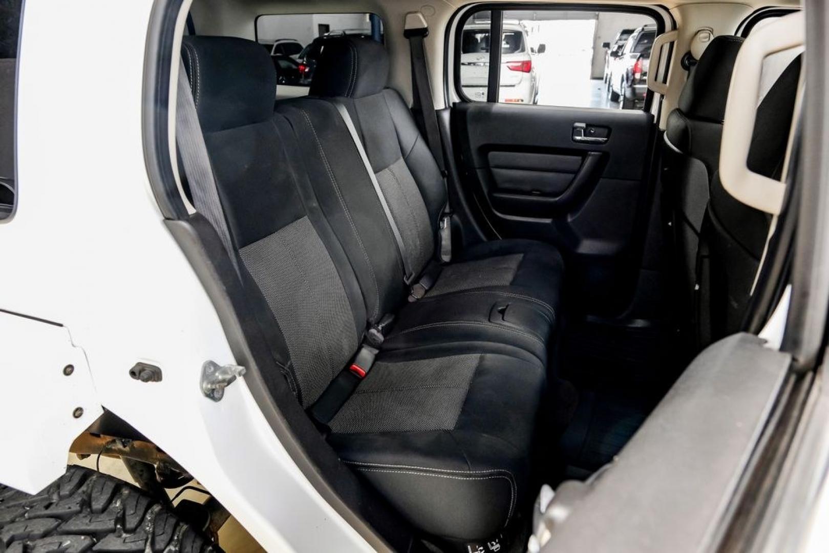 2009 Birch White /Ebony Hummer H3 Base (5GTEN13E998) with an 3.7L 5-Cylinder MPI DOHC engine, Automatic transmission, located at 15300 Midway Rd., Addison, TX, 75001, (972) 702-0011, 32.958321, -96.838074- Photo#38
