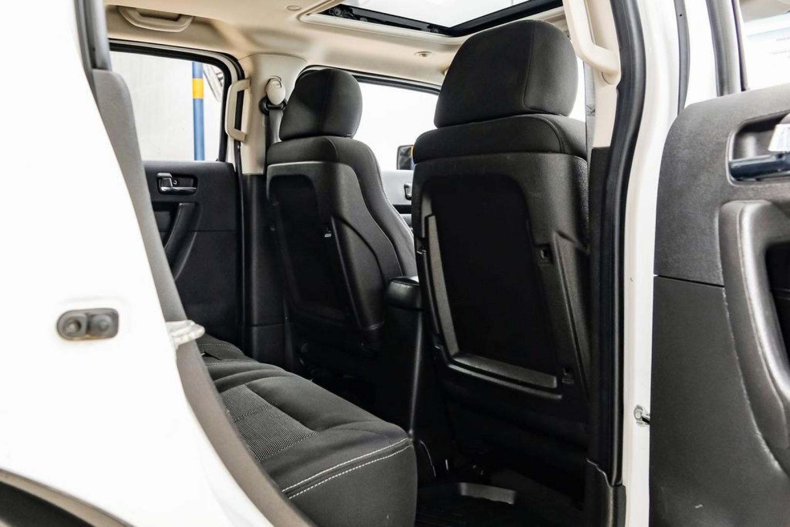 2009 Birch White /Ebony Hummer H3 Base (5GTEN13E998) with an 3.7L 5-Cylinder MPI DOHC engine, Automatic transmission, located at 15300 Midway Rd., Addison, TX, 75001, (972) 702-0011, 32.958321, -96.838074- Photo#39