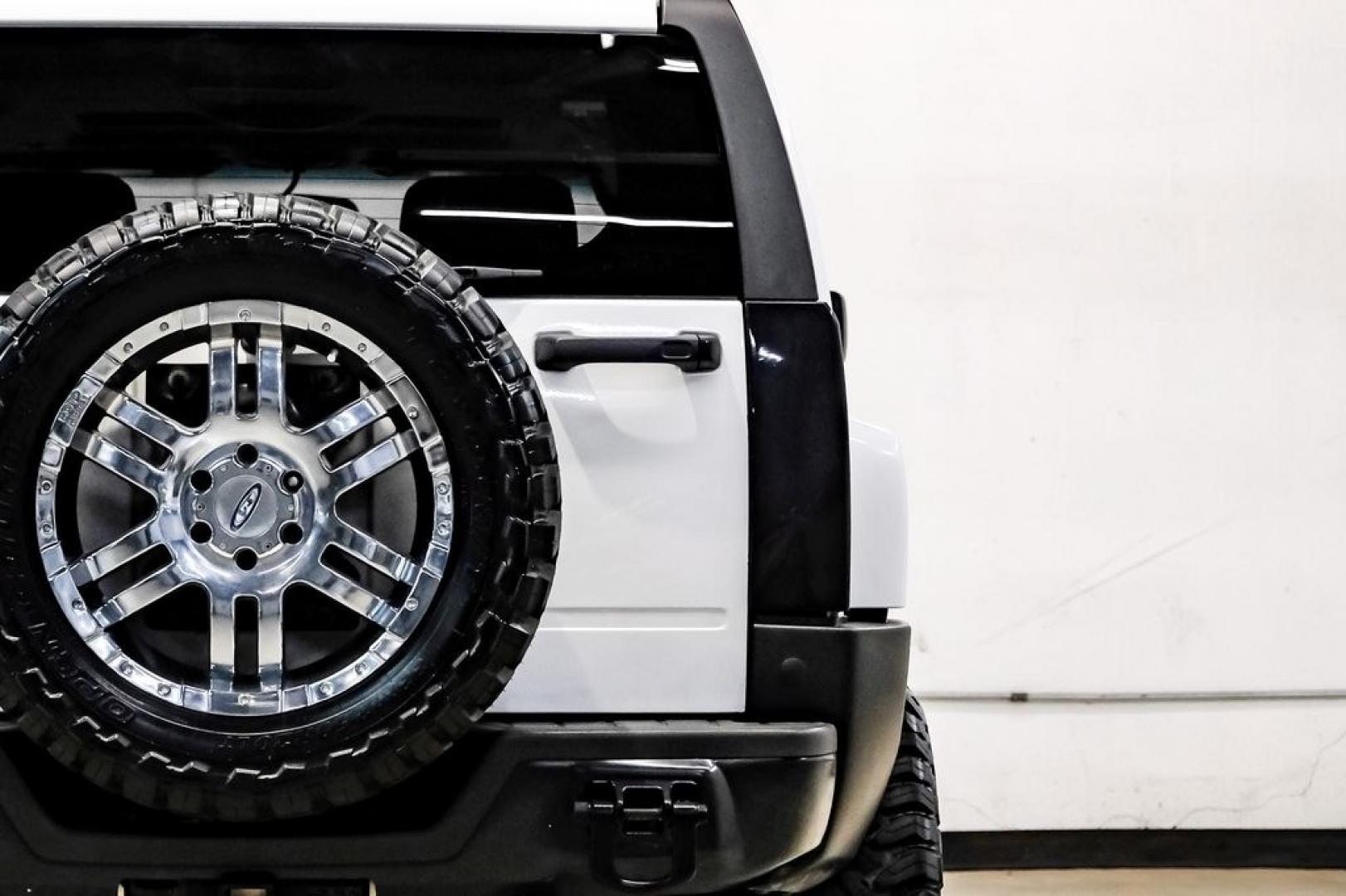 2009 Birch White /Ebony Hummer H3 Base (5GTEN13E998) with an 3.7L 5-Cylinder MPI DOHC engine, Automatic transmission, located at 15300 Midway Rd., Addison, TX, 75001, (972) 702-0011, 32.958321, -96.838074- Photo#49