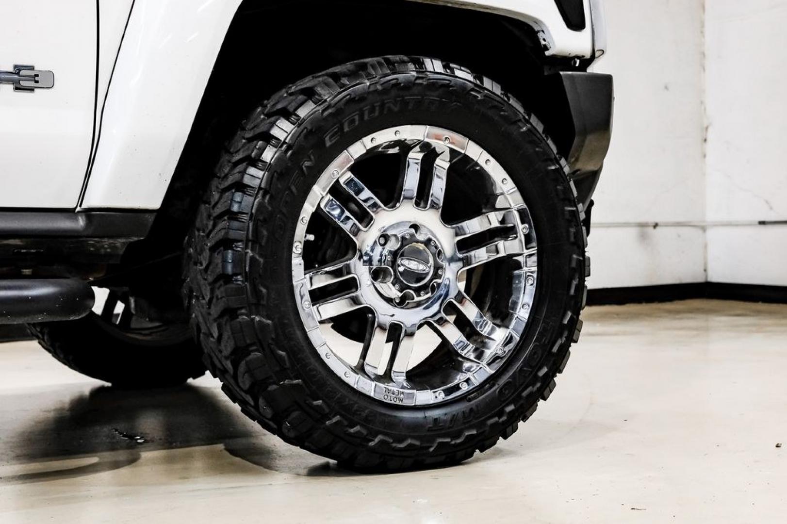 2009 Birch White /Ebony Hummer H3 Base (5GTEN13E998) with an 3.7L 5-Cylinder MPI DOHC engine, Automatic transmission, located at 15300 Midway Rd., Addison, TX, 75001, (972) 702-0011, 32.958321, -96.838074- Photo#56