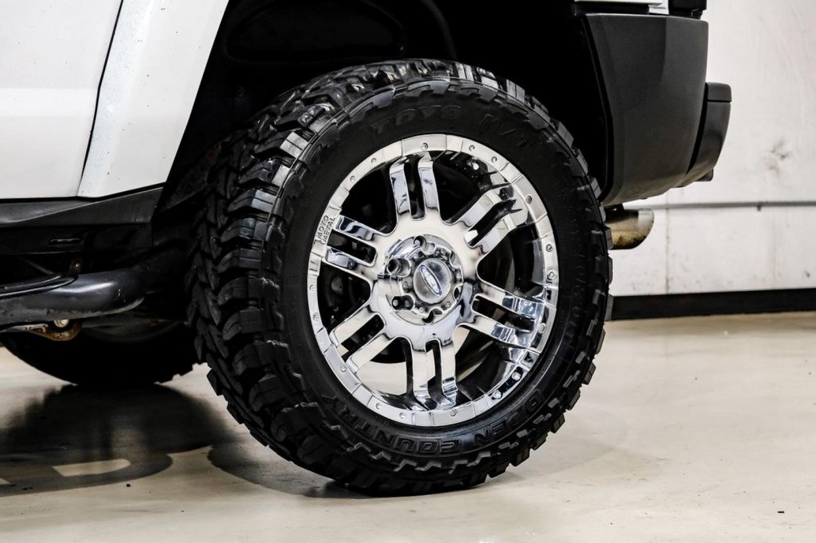 2009 Birch White /Ebony Hummer H3 Base (5GTEN13E998) with an 3.7L 5-Cylinder MPI DOHC engine, Automatic transmission, located at 15300 Midway Rd., Addison, TX, 75001, (972) 702-0011, 32.958321, -96.838074- Photo#58