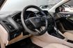 2017 Oxford White /Medium Light Stone Ford Focus SE (1FADP3FE0HL) with an EcoBoost 1.0L I3 GTDi DOHC Turbocharged VCT engine, Automatic transmission, located at 15300 Midway Rd., Addison, TX, 75001, (972) 702-0011, 32.958321, -96.838074- Photo#2