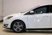 2017 Oxford White /Medium Light Stone Ford Focus SE (1FADP3FE0HL) with an EcoBoost 1.0L I3 GTDi DOHC Turbocharged VCT engine, Automatic transmission, located at 15300 Midway Rd., Addison, TX, 75001, (972) 702-0011, 32.958321, -96.838074- Photo#11