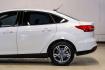 2017 Oxford White /Medium Light Stone Ford Focus SE (1FADP3FE0HL) with an EcoBoost 1.0L I3 GTDi DOHC Turbocharged VCT engine, Automatic transmission, located at 15300 Midway Rd., Addison, TX, 75001, (972) 702-0011, 32.958321, -96.838074- Photo#12