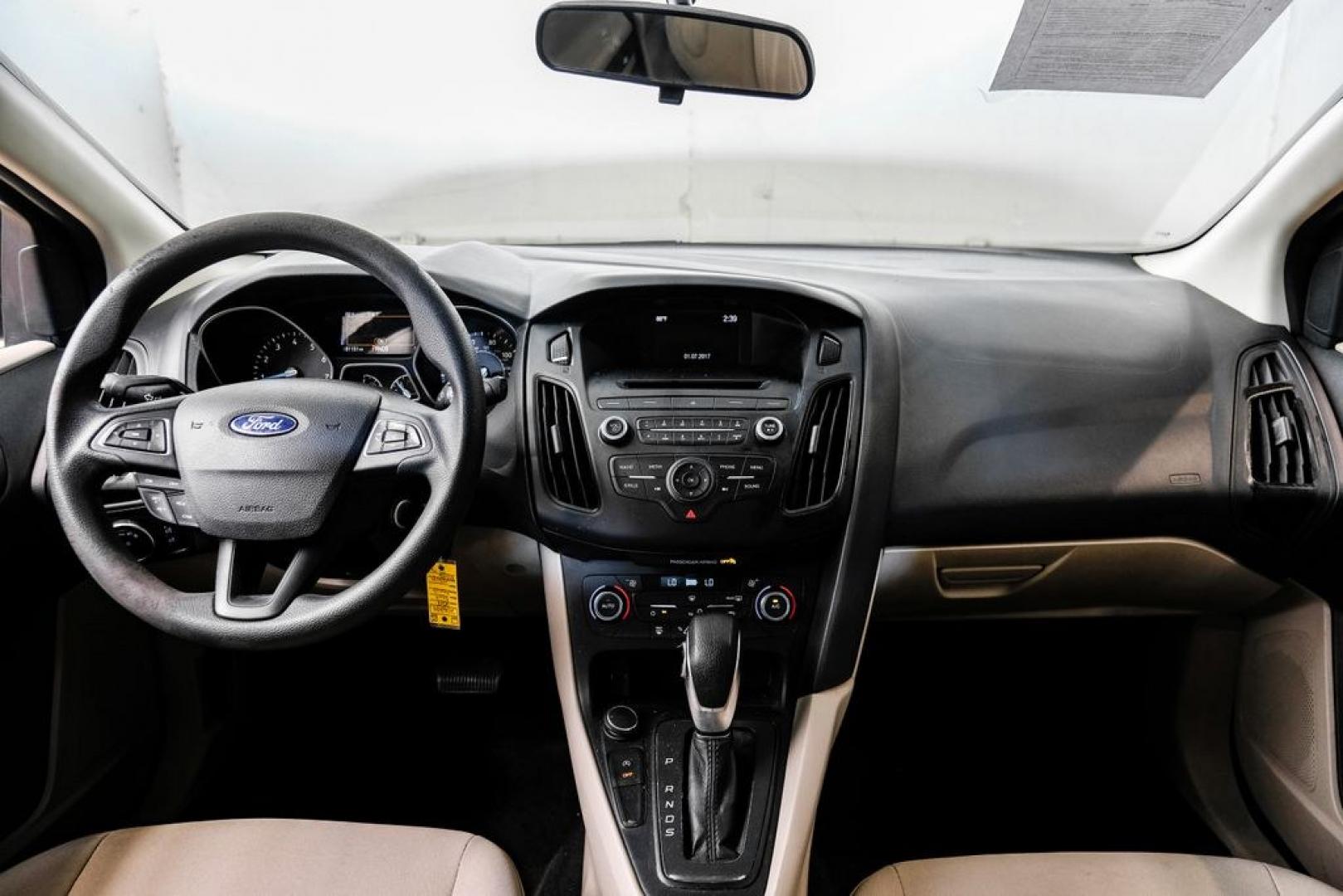 2017 Oxford White /Medium Light Stone Ford Focus SE (1FADP3FE0HL) with an EcoBoost 1.0L I3 GTDi DOHC Turbocharged VCT engine, Automatic transmission, located at 15300 Midway Rd., Addison, TX, 75001, (972) 702-0011, 32.958321, -96.838074- Photo#15
