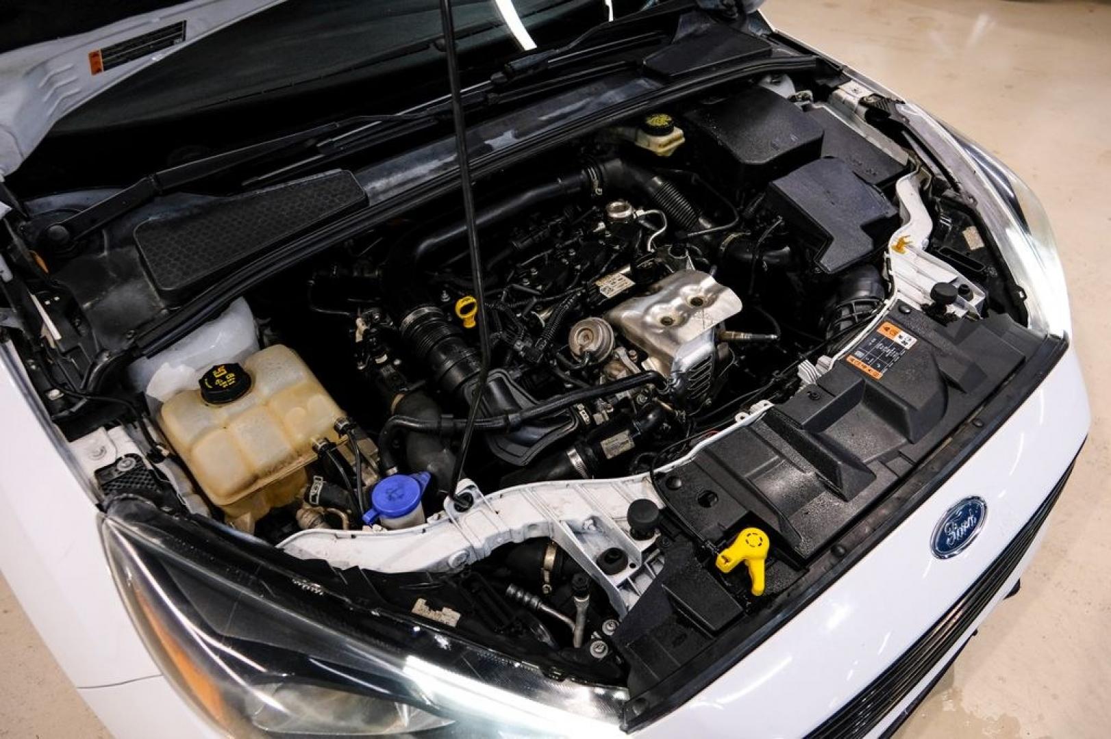 2017 Oxford White /Medium Light Stone Ford Focus SE (1FADP3FE0HL) with an EcoBoost 1.0L I3 GTDi DOHC Turbocharged VCT engine, Automatic transmission, located at 15300 Midway Rd., Addison, TX, 75001, (972) 702-0011, 32.958321, -96.838074- Photo#48