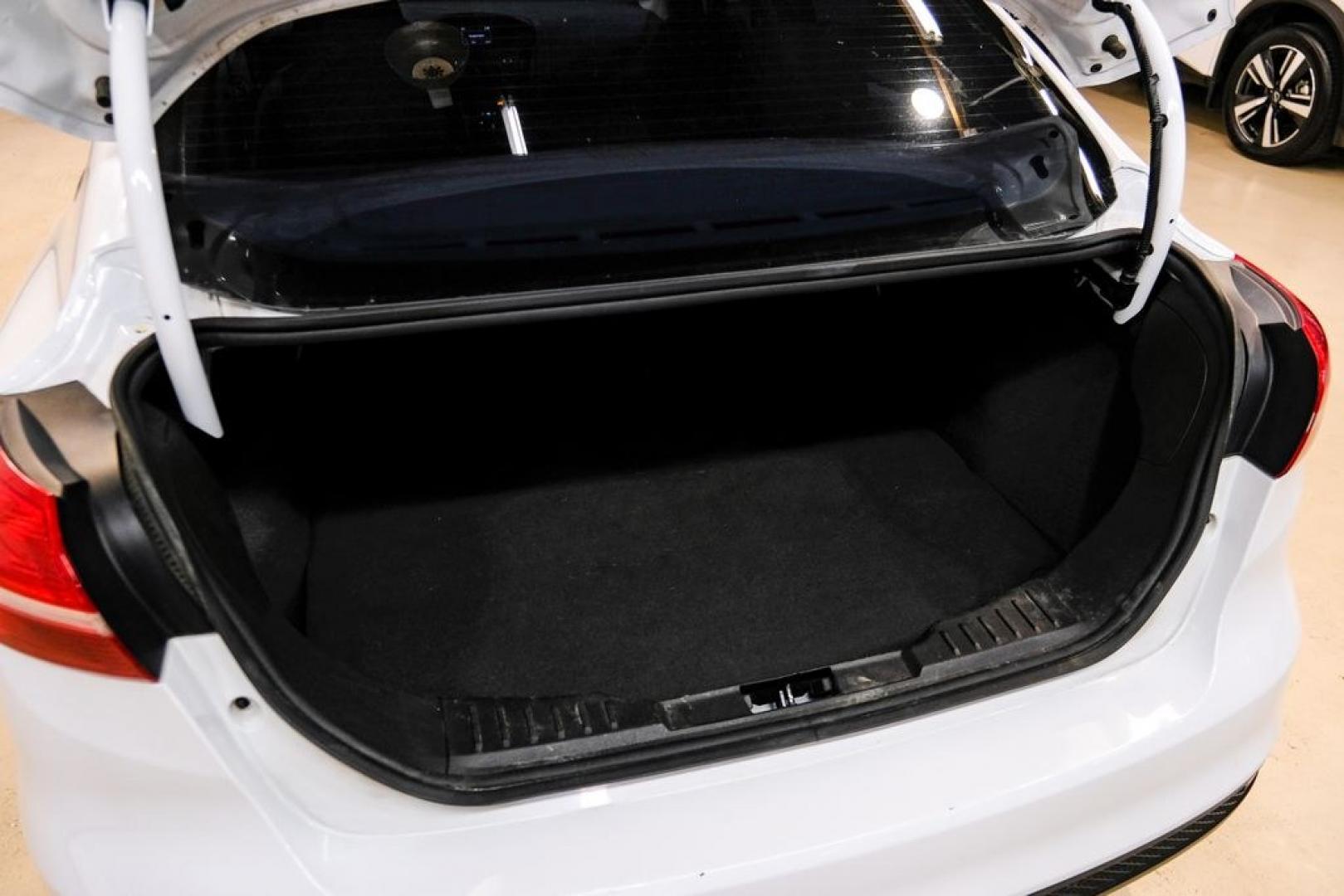 2017 Oxford White /Medium Light Stone Ford Focus SE (1FADP3FE0HL) with an EcoBoost 1.0L I3 GTDi DOHC Turbocharged VCT engine, Automatic transmission, located at 15300 Midway Rd., Addison, TX, 75001, (972) 702-0011, 32.958321, -96.838074- Photo#50