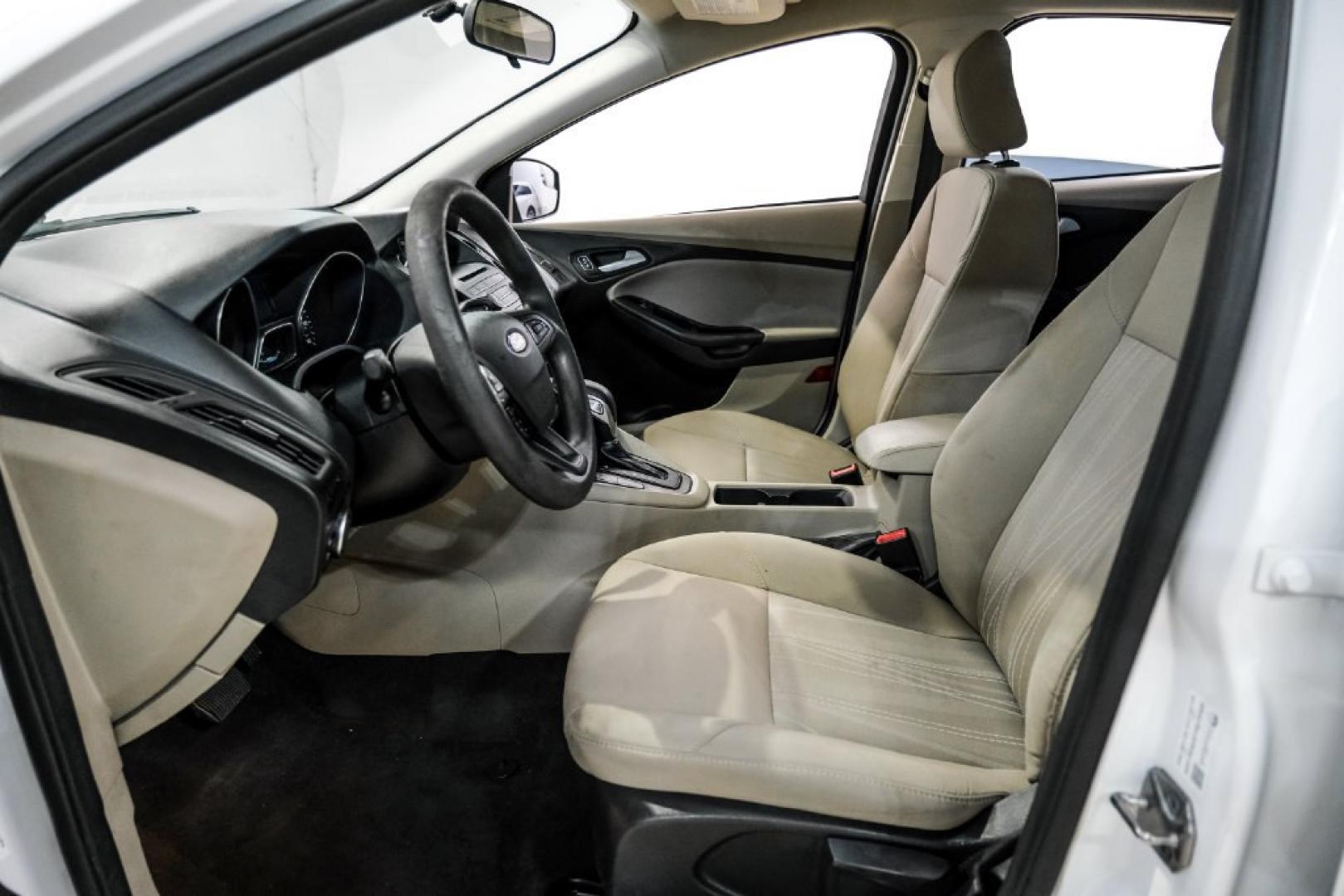 2017 Oxford White /Medium Light Stone Ford Focus SE (1FADP3FE0HL) with an EcoBoost 1.0L I3 GTDi DOHC Turbocharged VCT engine, Automatic transmission, located at 15300 Midway Rd., Addison, TX, 75001, (972) 702-0011, 32.958321, -96.838074- Photo#3