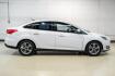 2017 Oxford White /Medium Light Stone Ford Focus SE (1FADP3FE0HL) with an EcoBoost 1.0L I3 GTDi DOHC Turbocharged VCT engine, Automatic transmission, located at 15300 Midway Rd., Addison, TX, 75001, (972) 702-0011, 32.958321, -96.838074- Photo#6