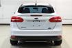 2017 Oxford White /Medium Light Stone Ford Focus SE (1FADP3FE0HL) with an EcoBoost 1.0L I3 GTDi DOHC Turbocharged VCT engine, Automatic transmission, located at 15300 Midway Rd., Addison, TX, 75001, (972) 702-0011, 32.958321, -96.838074- Photo#8