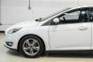 2017 Oxford White /Medium Light Stone Ford Focus SE (1FADP3FE0HL) with an EcoBoost 1.0L I3 GTDi DOHC Turbocharged VCT engine, Automatic transmission, located at 15300 Midway Rd., Addison, TX, 75001, (972) 702-0011, 32.958321, -96.838074- Photo#11