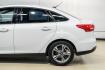 2017 Oxford White /Medium Light Stone Ford Focus SE (1FADP3FE0HL) with an EcoBoost 1.0L I3 GTDi DOHC Turbocharged VCT engine, Automatic transmission, located at 15300 Midway Rd., Addison, TX, 75001, (972) 702-0011, 32.958321, -96.838074- Photo#12