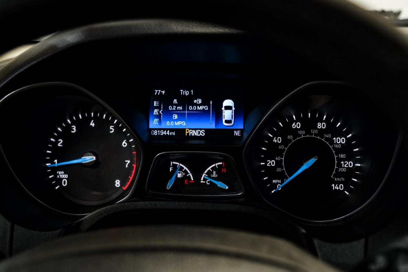 2017 Oxford White /Medium Light Stone Ford Focus SE (1FADP3FE0HL) with an EcoBoost 1.0L I3 GTDi DOHC Turbocharged VCT engine, Automatic transmission, located at 15300 Midway Rd., Addison, TX, 75001, (972) 702-0011, 32.958321, -96.838074- Photo#19