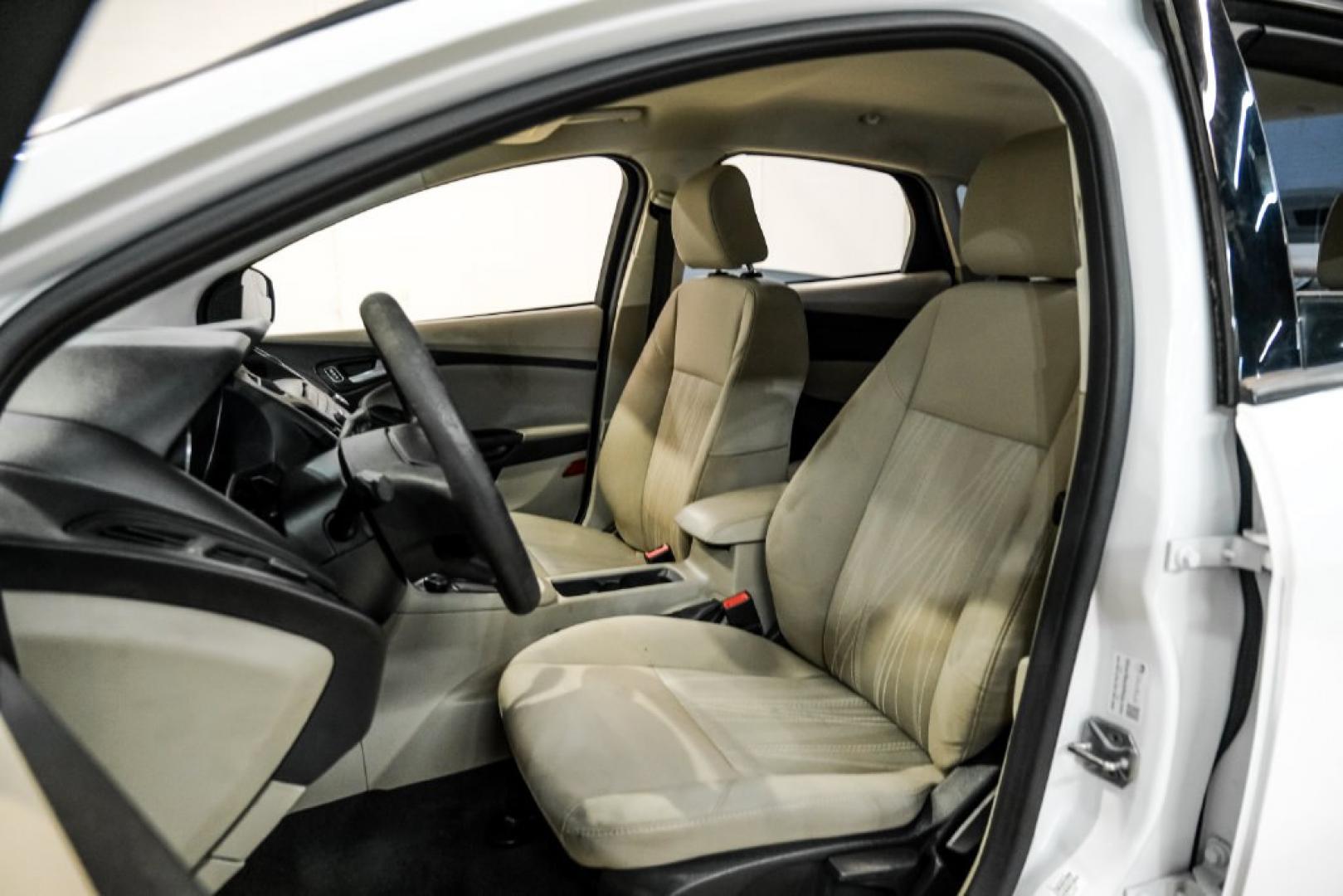 2017 Oxford White /Medium Light Stone Ford Focus SE (1FADP3FE0HL) with an EcoBoost 1.0L I3 GTDi DOHC Turbocharged VCT engine, Automatic transmission, located at 15300 Midway Rd., Addison, TX, 75001, (972) 702-0011, 32.958321, -96.838074- Photo#30