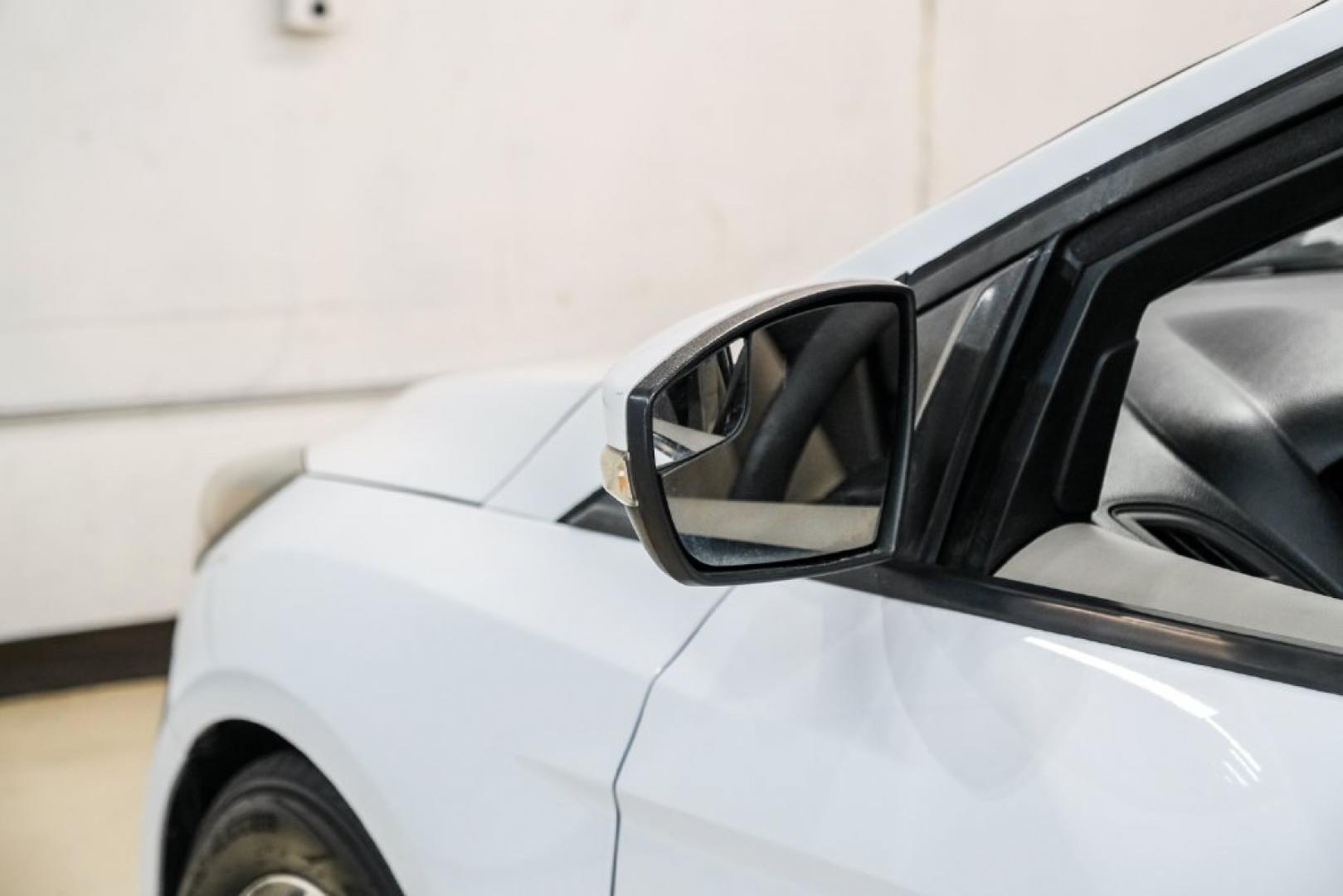 2017 Oxford White /Medium Light Stone Ford Focus SE (1FADP3FE0HL) with an EcoBoost 1.0L I3 GTDi DOHC Turbocharged VCT engine, Automatic transmission, located at 15300 Midway Rd., Addison, TX, 75001, (972) 702-0011, 32.958321, -96.838074- Photo#39