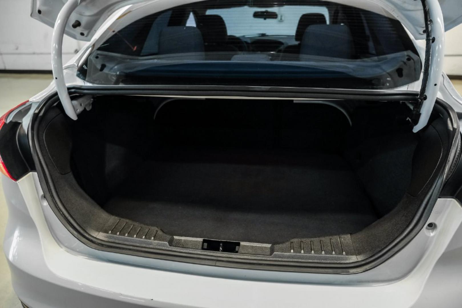 2017 Oxford White /Medium Light Stone Ford Focus SE (1FADP3FE0HL) with an EcoBoost 1.0L I3 GTDi DOHC Turbocharged VCT engine, Automatic transmission, located at 15300 Midway Rd., Addison, TX, 75001, (972) 702-0011, 32.958321, -96.838074- Photo#50