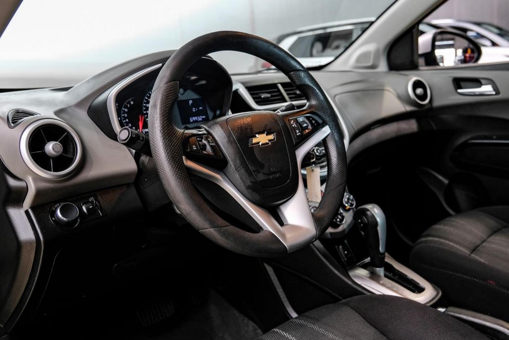 2020 Silver Ice Metallic /Jet Black/Dark Titanium Chevrolet Sonic LT (1G1JD5SB5L4) with an I4 engine, Automatic transmission, located at 15300 Midway Rd., Addison, TX, 75001, (972) 702-0011, 32.958321, -96.838074- Photo#2