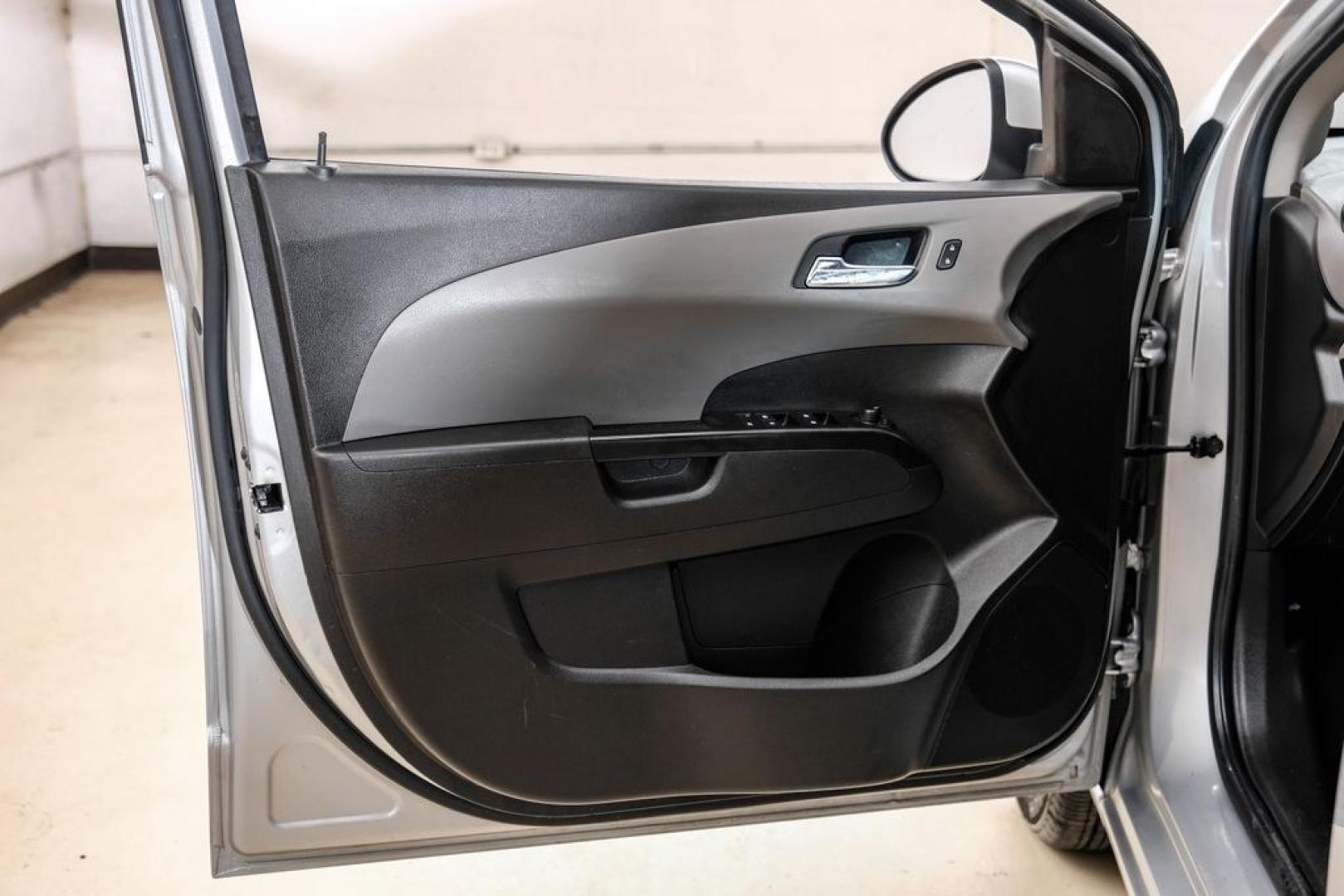 2020 Silver Ice Metallic /Jet Black/Dark Titanium Chevrolet Sonic LT (1G1JD5SB5L4) with an I4 engine, Automatic transmission, located at 15300 Midway Rd., Addison, TX, 75001, (972) 702-0011, 32.958321, -96.838074- Photo#48
