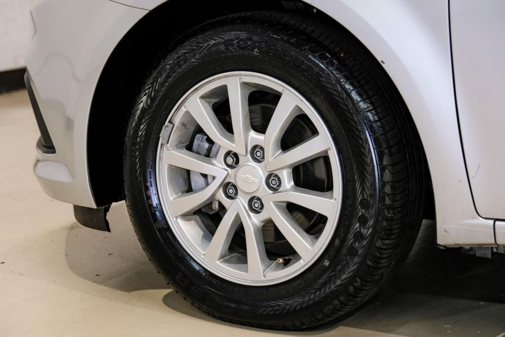 2020 Silver Ice Metallic /Jet Black/Dark Titanium Chevrolet Sonic LT (1G1JD5SB5L4) with an I4 engine, Automatic transmission, located at 15300 Midway Rd., Addison, TX, 75001, (972) 702-0011, 32.958321, -96.838074- Photo#63
