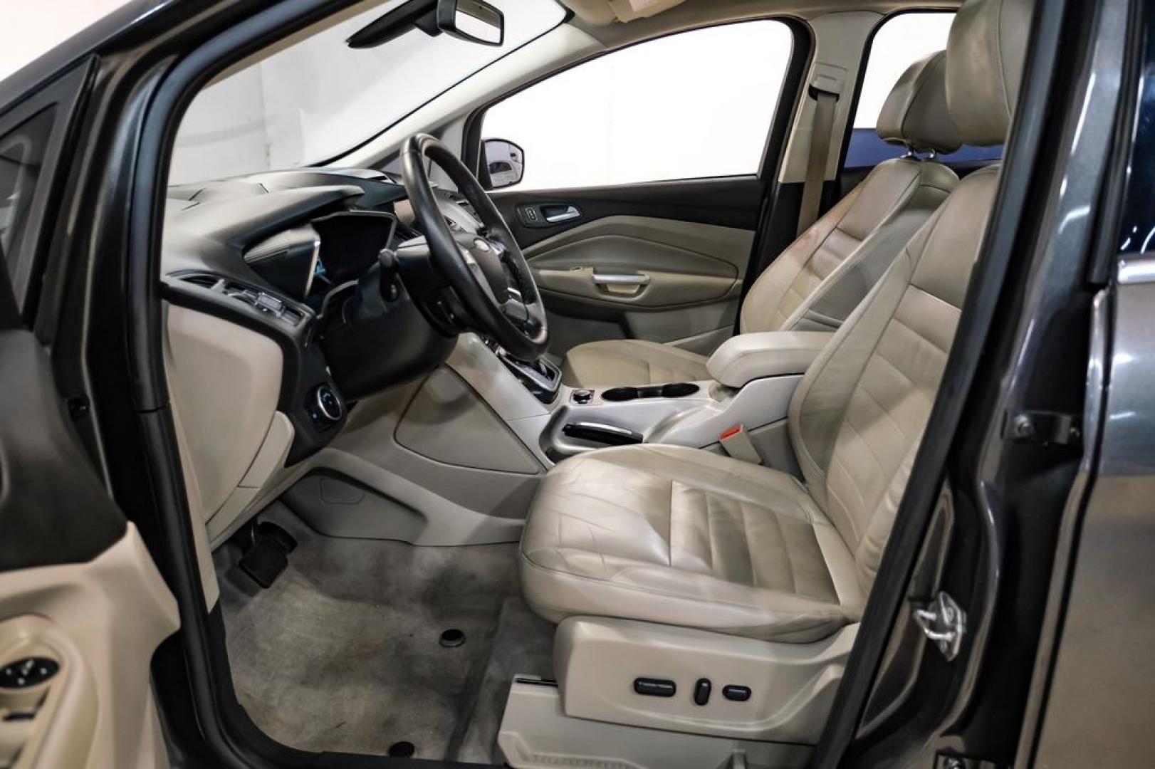 2015 Magnetic /Medium Light Stone Ford C-Max Energi SEL (1FADP5CUXFL) with an I4 Hybrid engine, CVT transmission, located at 15300 Midway Rd., Addison, TX, 75001, (972) 702-0011, 32.958321, -96.838074- Photo#3