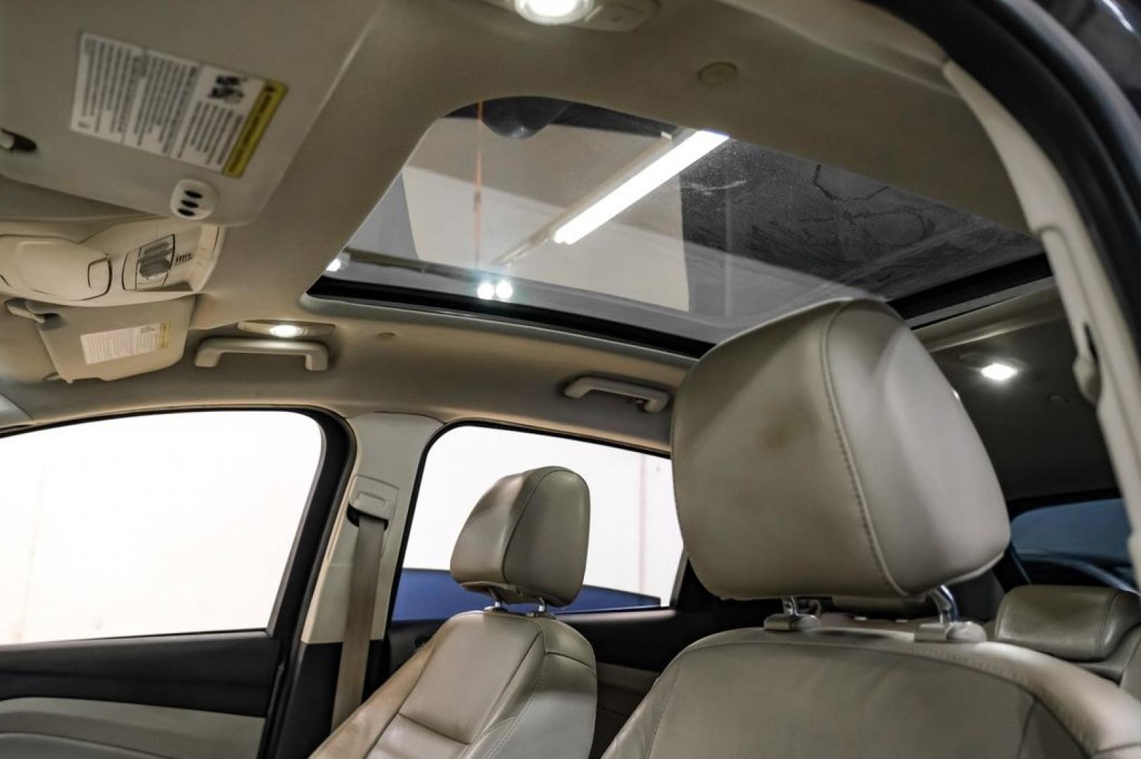 2015 Magnetic /Medium Light Stone Ford C-Max Energi SEL (1FADP5CUXFL) with an I4 Hybrid engine, CVT transmission, located at 15300 Midway Rd., Addison, TX, 75001, (972) 702-0011, 32.958321, -96.838074- Photo#4