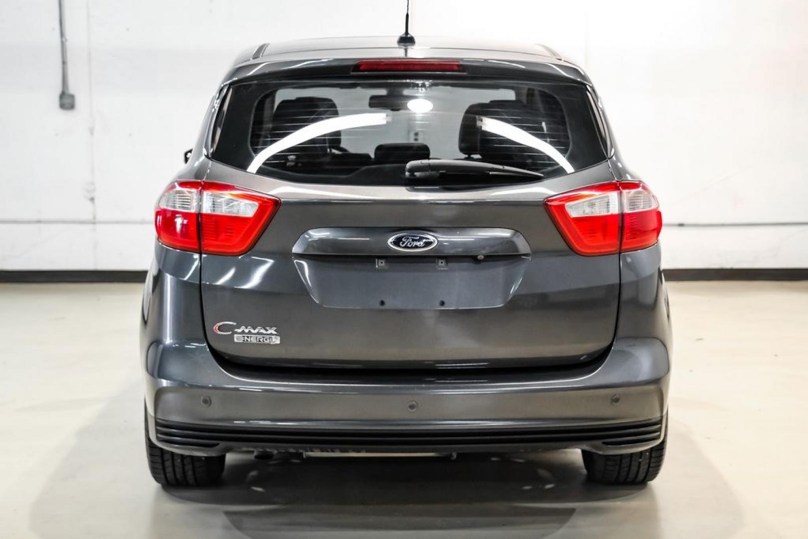 2015 Magnetic /Medium Light Stone Ford C-Max Energi SEL (1FADP5CUXFL) with an I4 Hybrid engine, CVT transmission, located at 15300 Midway Rd., Addison, TX, 75001, (972) 702-0011, 32.958321, -96.838074- Photo#9
