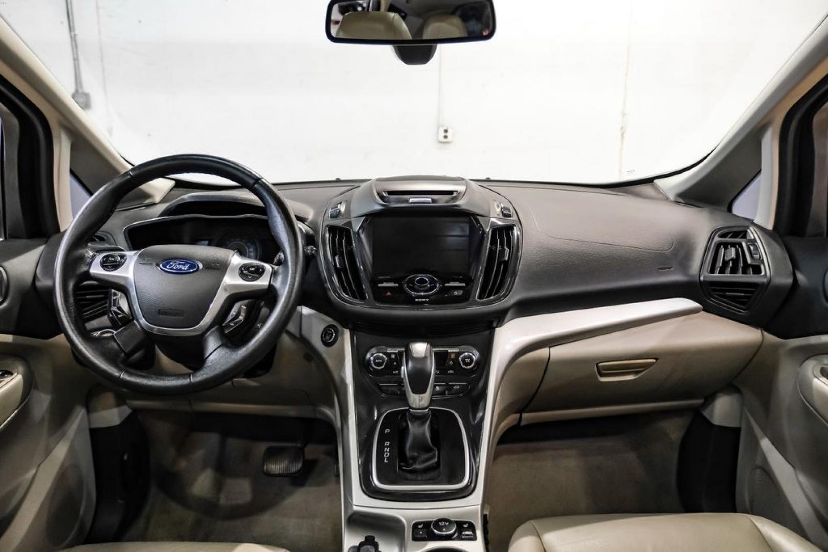 2015 Magnetic /Medium Light Stone Ford C-Max Energi SEL (1FADP5CUXFL) with an I4 Hybrid engine, CVT transmission, located at 15300 Midway Rd., Addison, TX, 75001, (972) 702-0011, 32.958321, -96.838074- Photo#13