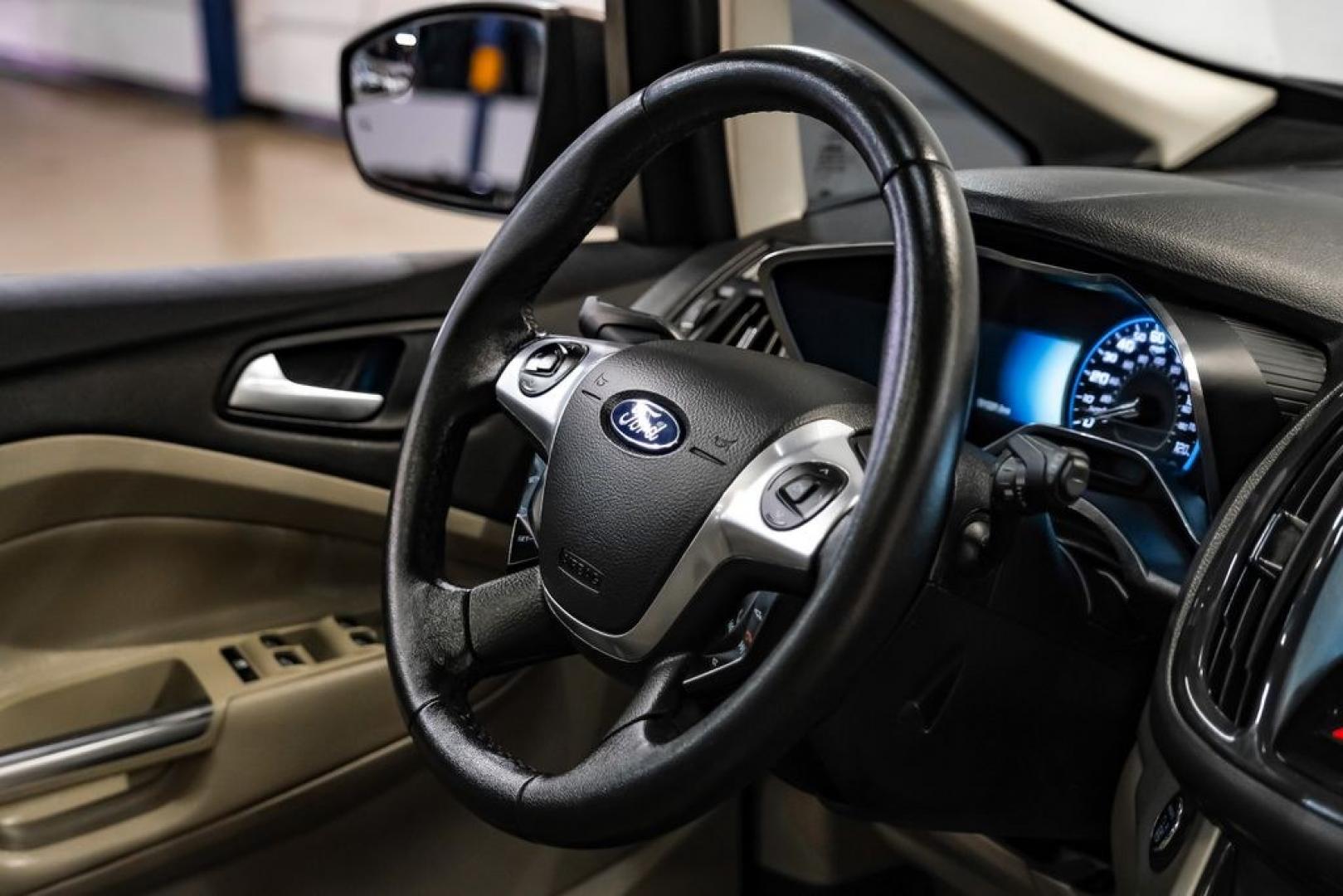 2015 Magnetic /Medium Light Stone Ford C-Max Energi SEL (1FADP5CUXFL) with an I4 Hybrid engine, CVT transmission, located at 15300 Midway Rd., Addison, TX, 75001, (972) 702-0011, 32.958321, -96.838074- Photo#14