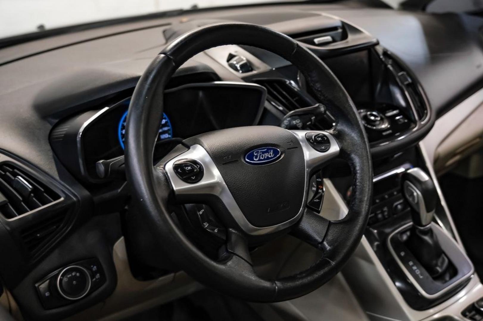 2015 Magnetic /Medium Light Stone Ford C-Max Energi SEL (1FADP5CUXFL) with an I4 Hybrid engine, CVT transmission, located at 15300 Midway Rd., Addison, TX, 75001, (972) 702-0011, 32.958321, -96.838074- Photo#15