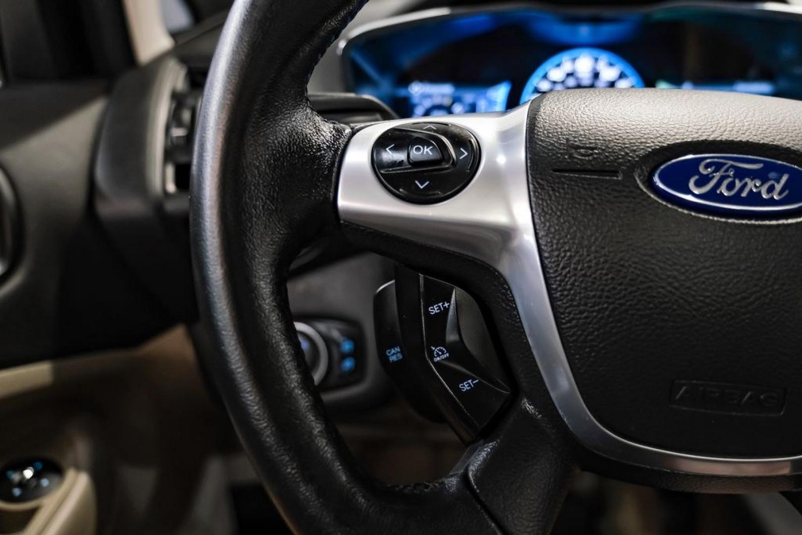 2015 Magnetic /Medium Light Stone Ford C-Max Energi SEL (1FADP5CUXFL) with an I4 Hybrid engine, CVT transmission, located at 15300 Midway Rd., Addison, TX, 75001, (972) 702-0011, 32.958321, -96.838074- Photo#16